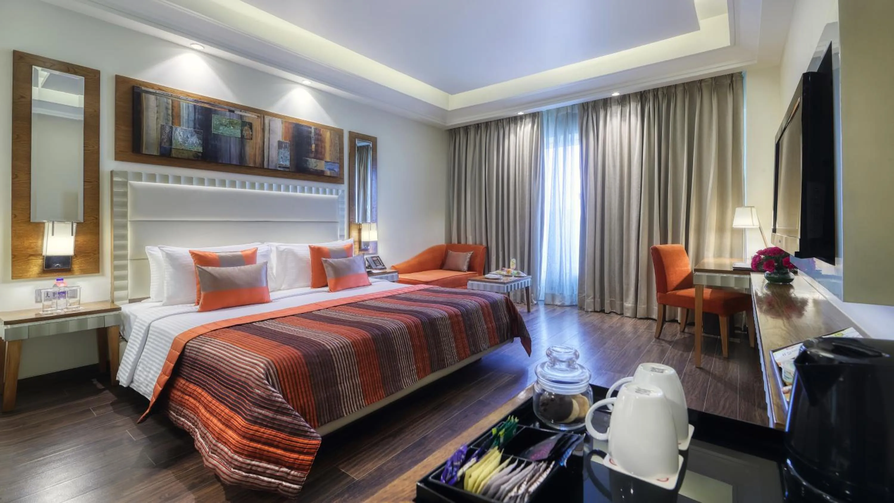 Premium Queen Room - single occupancy - Non-Smoking with Happy Hours (1+1 ;only applicable for IMFL not all the Brand at the bar),15% Discount on F&B,INR 500 Spa Credit in Ramada Gurgaon Central