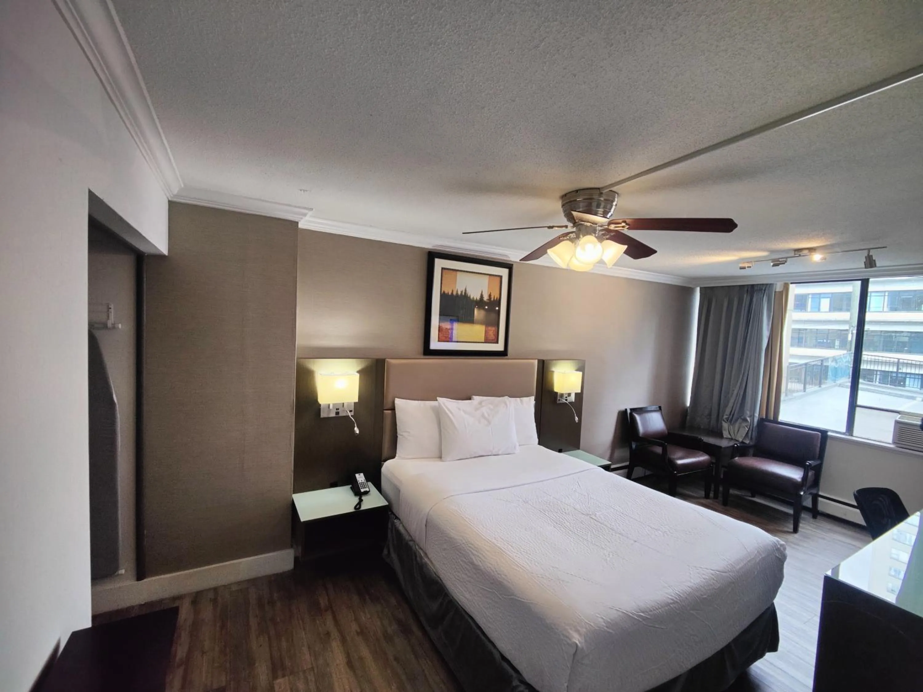 Queen Room - single occupancy in Divya Sutra Suites on Robson Downtown Vancouver
