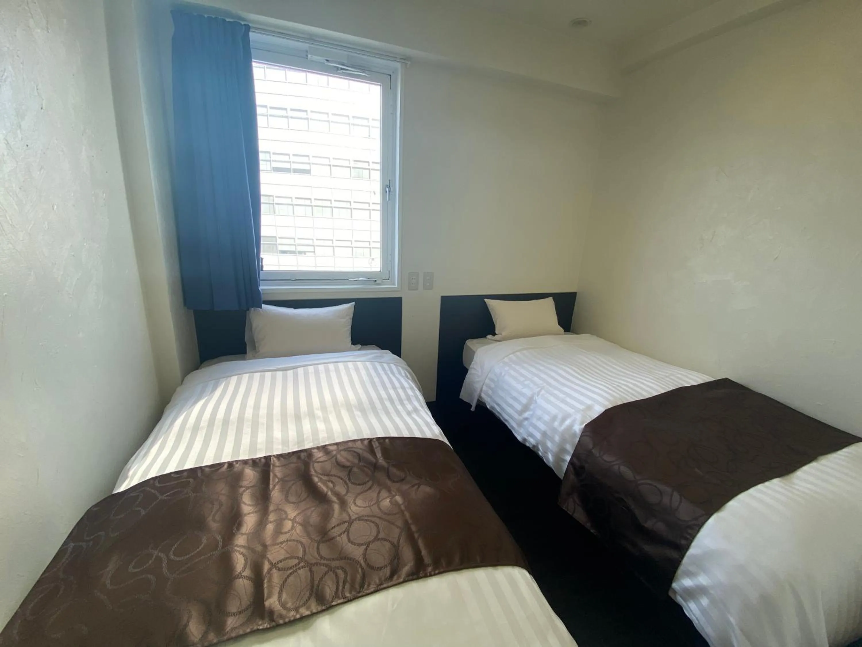 Economy Twin Room in Hotel Mayflower Sendai