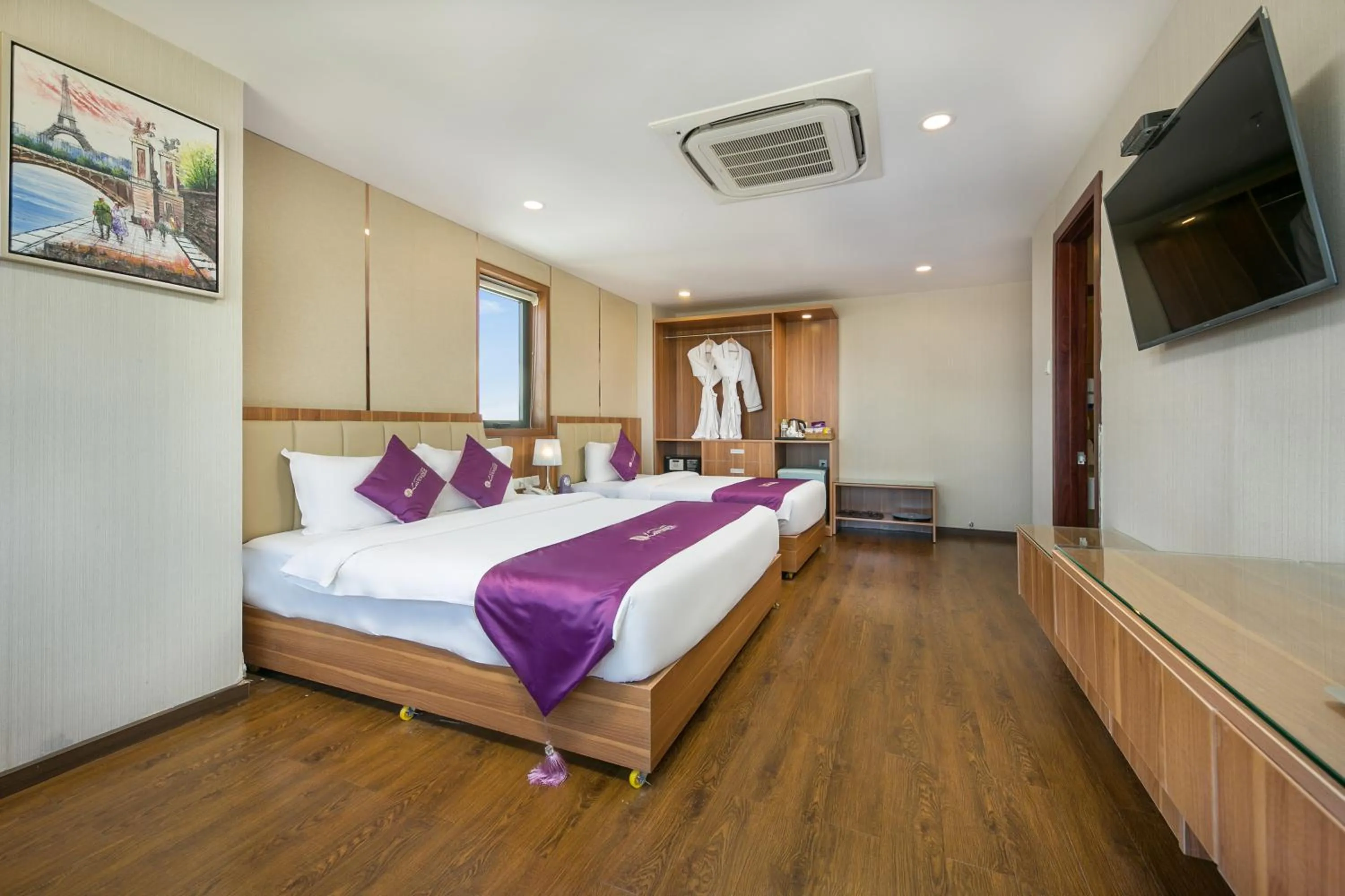 Deluxe Triple Room with River View in Lavender Riverside Hotel