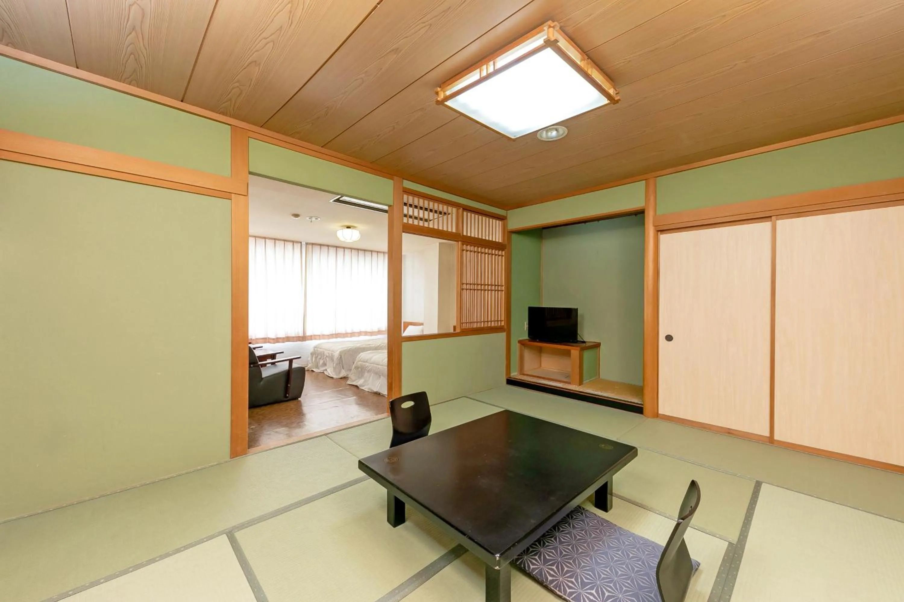 Twin Room with Tatami Area with Shared Bathroom - South Tower in Itoen Hotel New Sakura