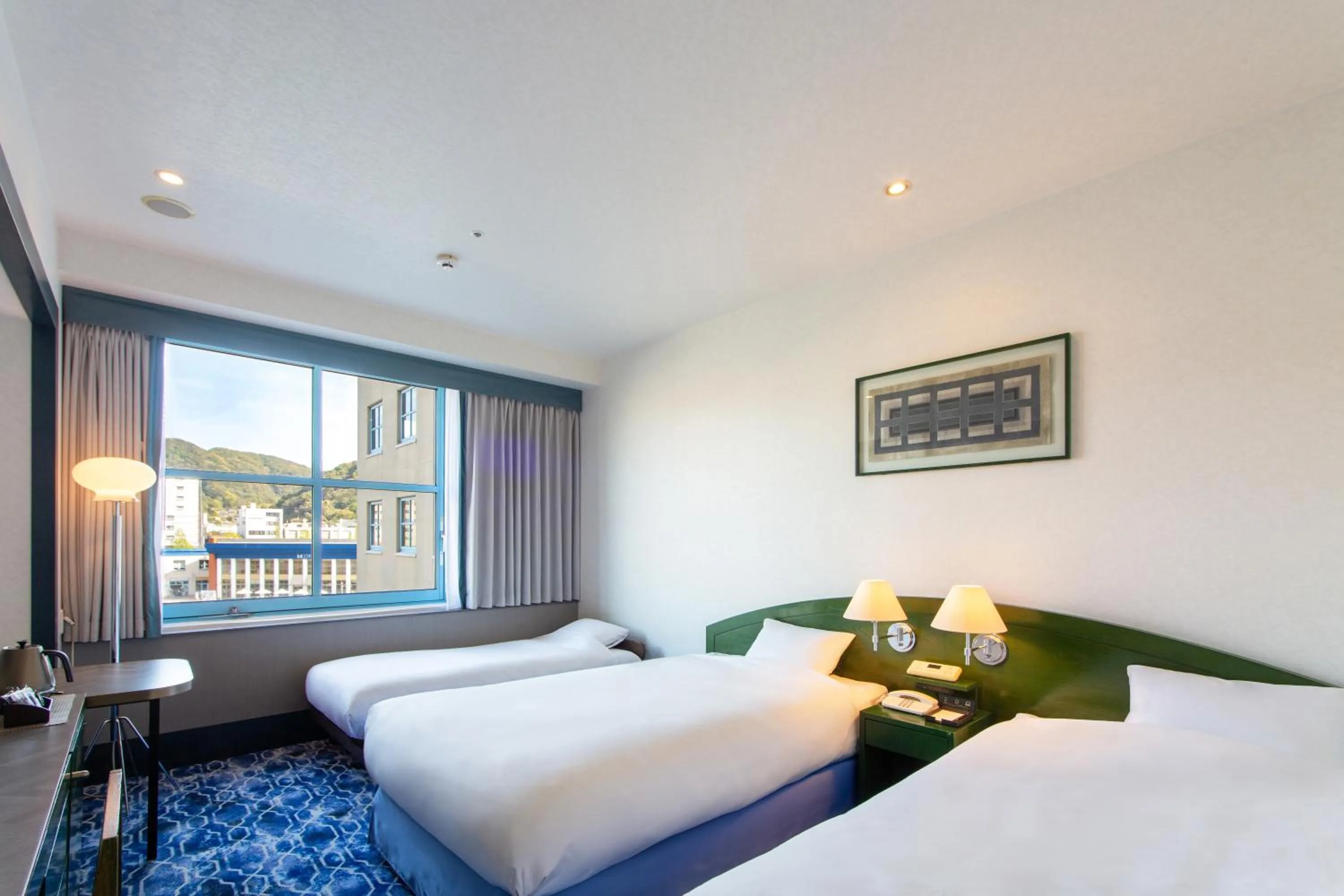 Twin Room with Extra Bed and City View in Premier Hotel Mojiko