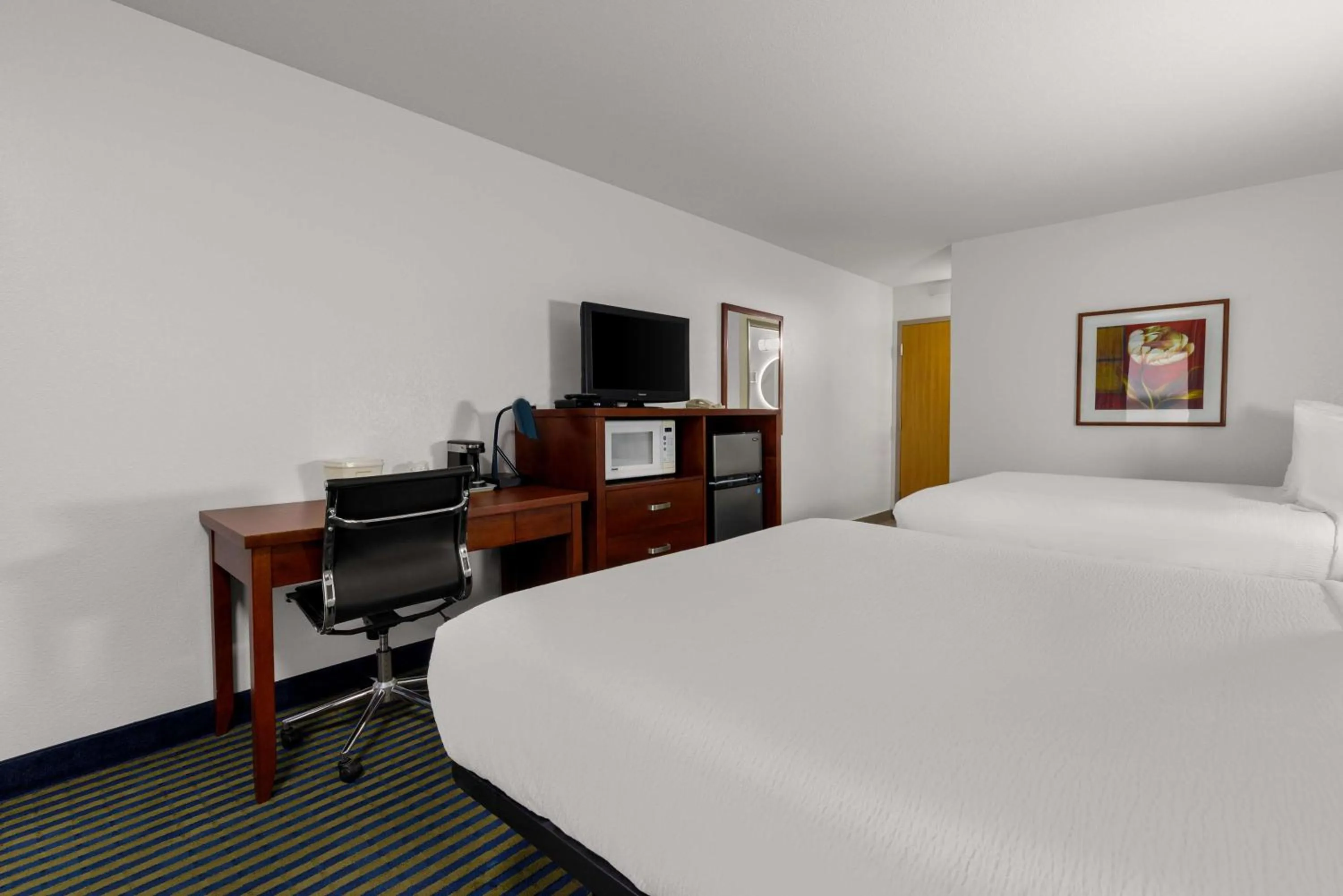 Queen Room with Two Queen Beds in SureStay Plus by Best Western Brooks