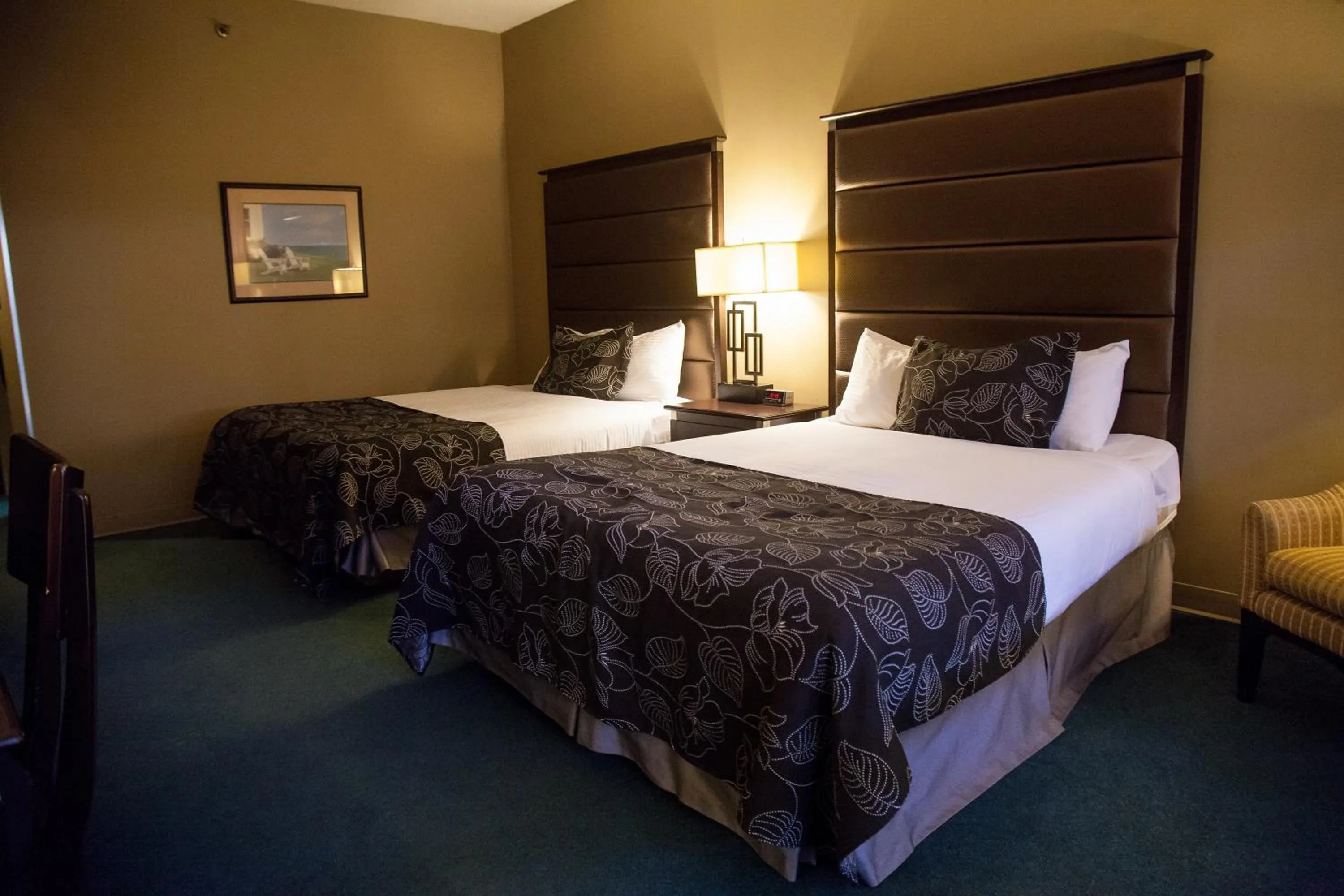 Deluxe Queen Room with Two Queen Beds and Pool View - Mobility Access/Non-Smoking in Medicine Hat Lodge, Trademark Collection by Wyndham