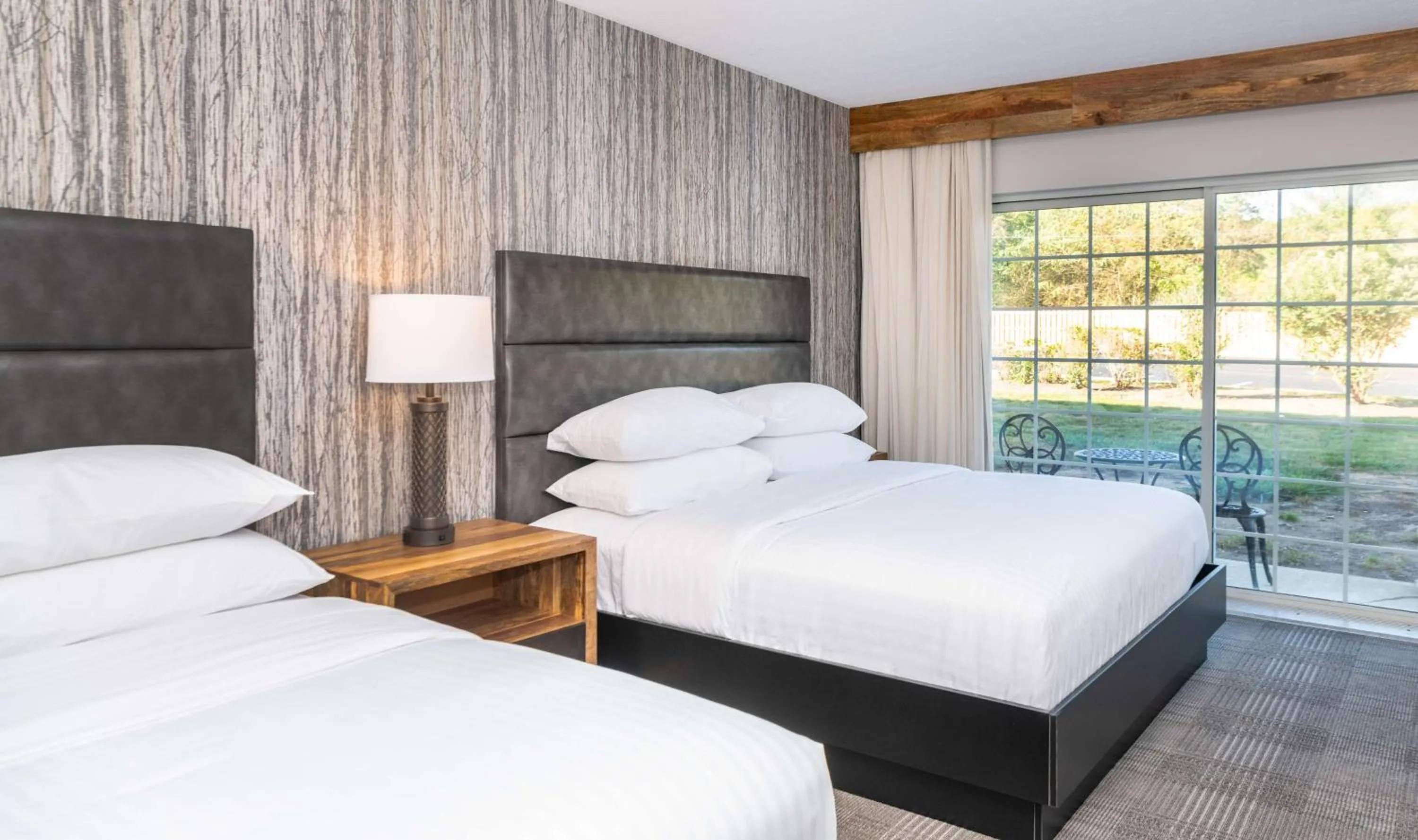 King Room with Two King Beds and Sofa Bed - Courtyard View in Cherry Valley Hotel