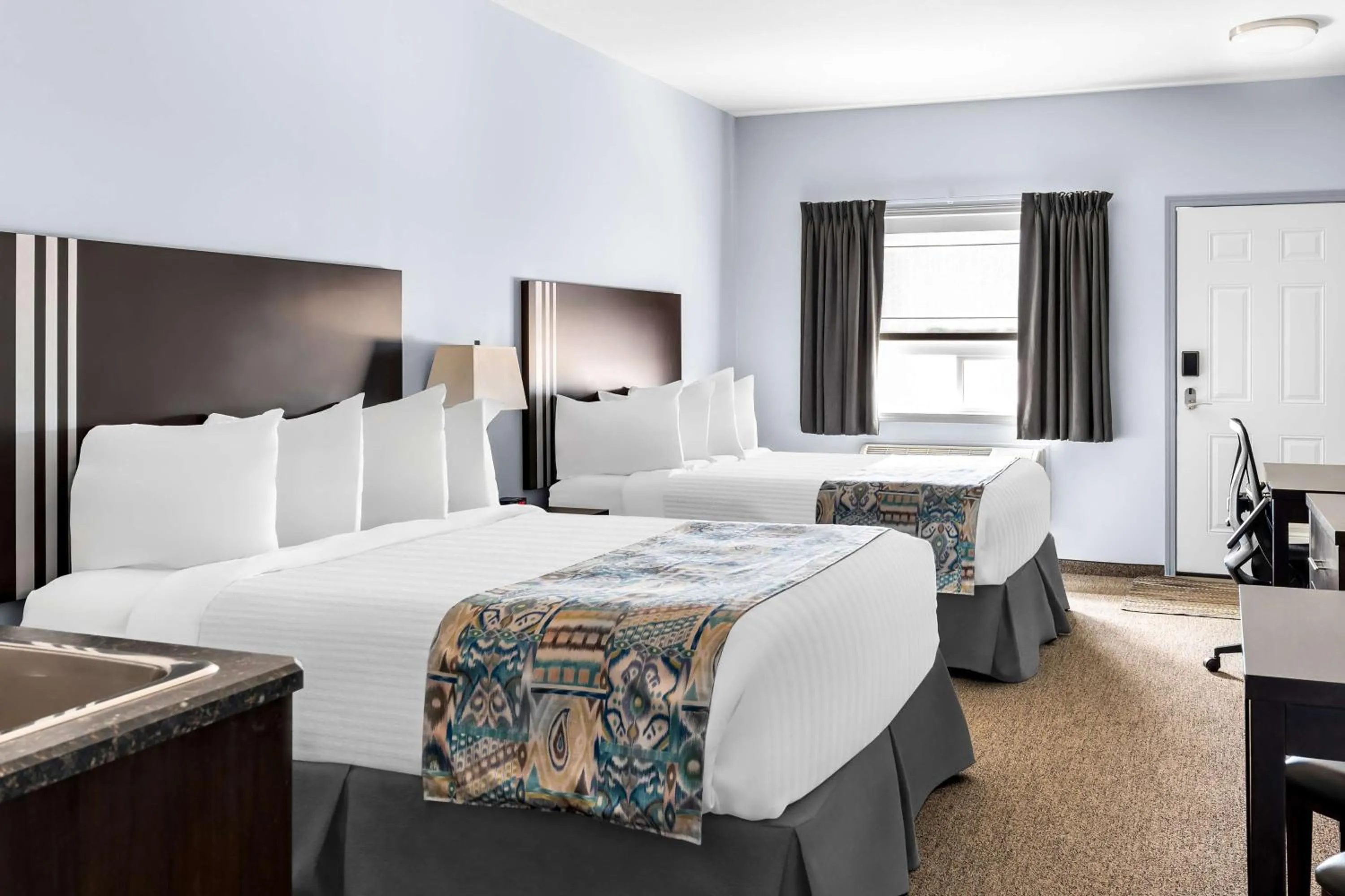 Queen Room with Two Queen Beds in SureStay Studio by Best Western Hardisty