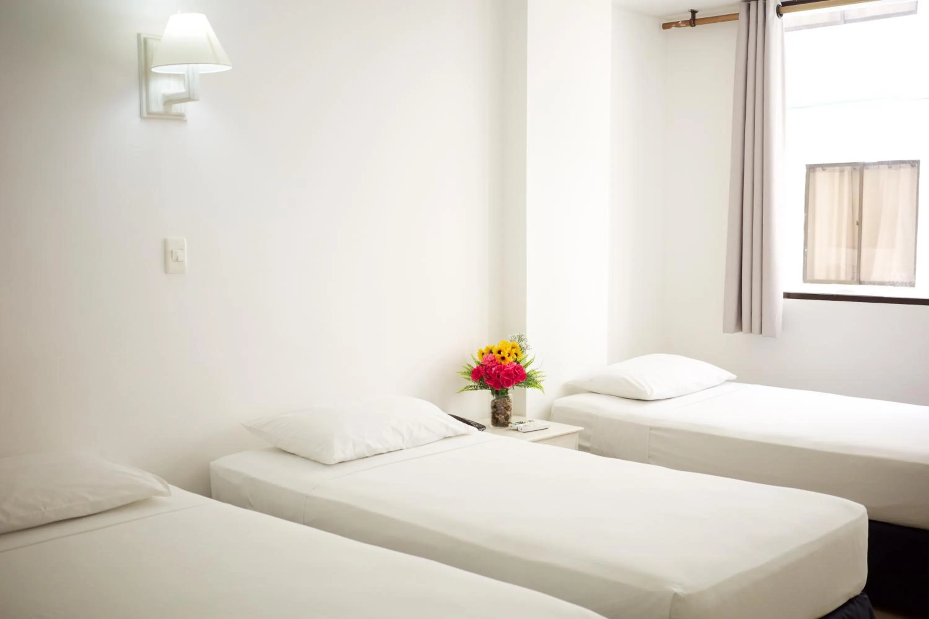 Quadruple Room in Hotel La Riviera