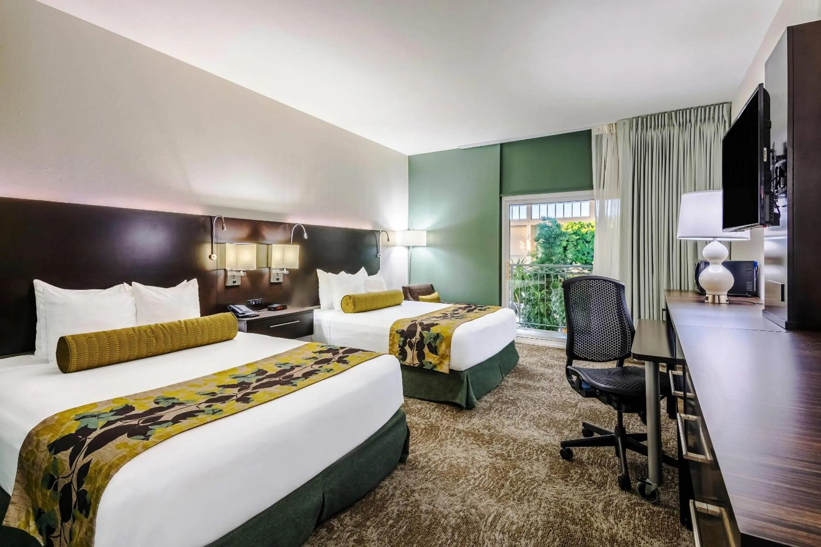 Queen Room with Two Queen Beds and Pool View - Non-Smoking in Oasis Hotel and Conv Center, an Ascend Collection Hotel