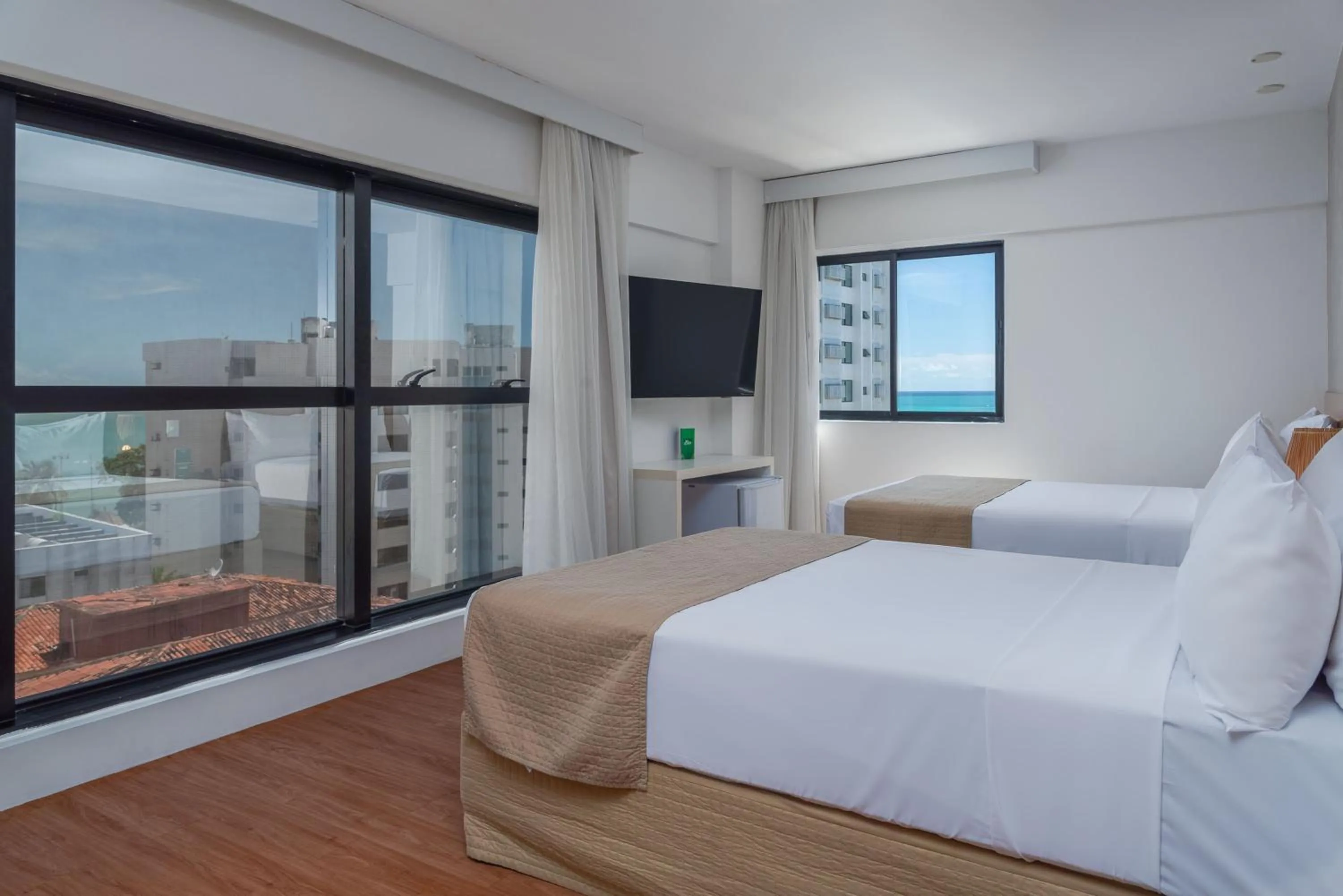 Family Room with Side Sea View in Palms Ponta Verde by Tropicalis