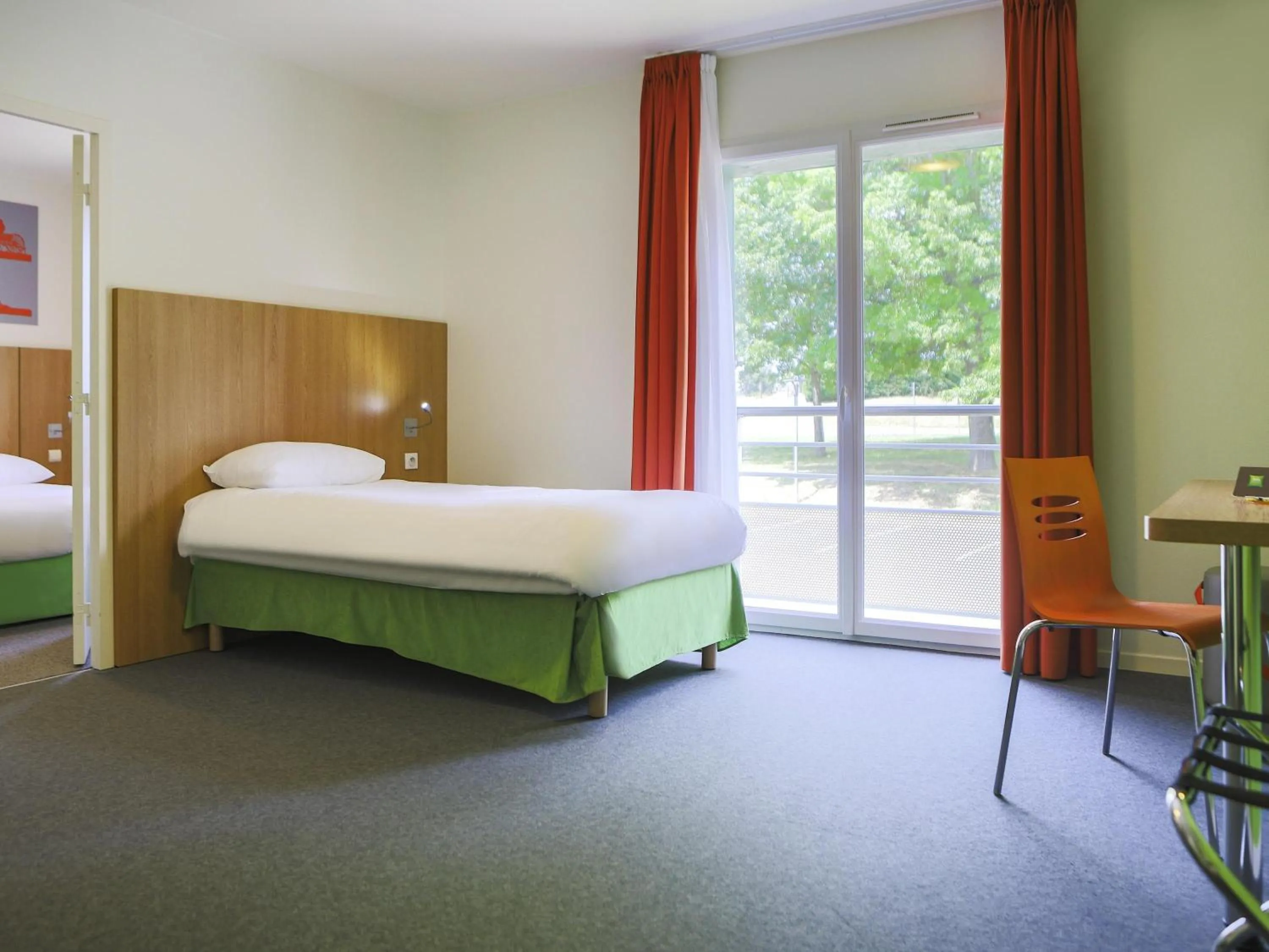 Family Room with Double Bed and DoubleSofa Bed in ibis Styles Bourbon Lancy