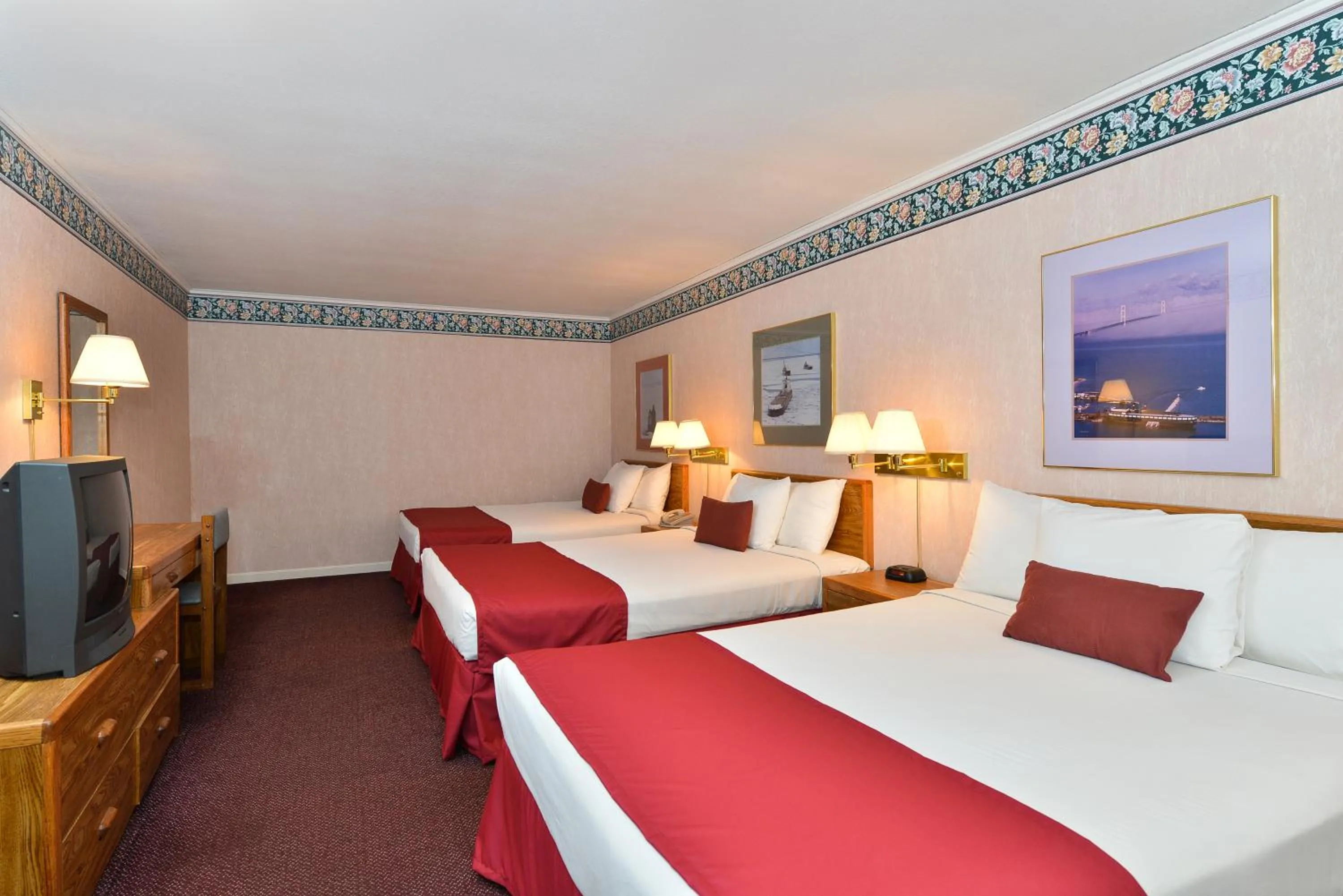 Family Room with 3 Queen Beds  in Americas Best Value Inn Mackinaw City