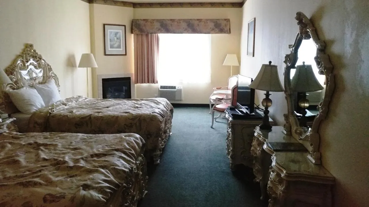 Queen Room with Two Queen Beds in Palace Inn & Suites