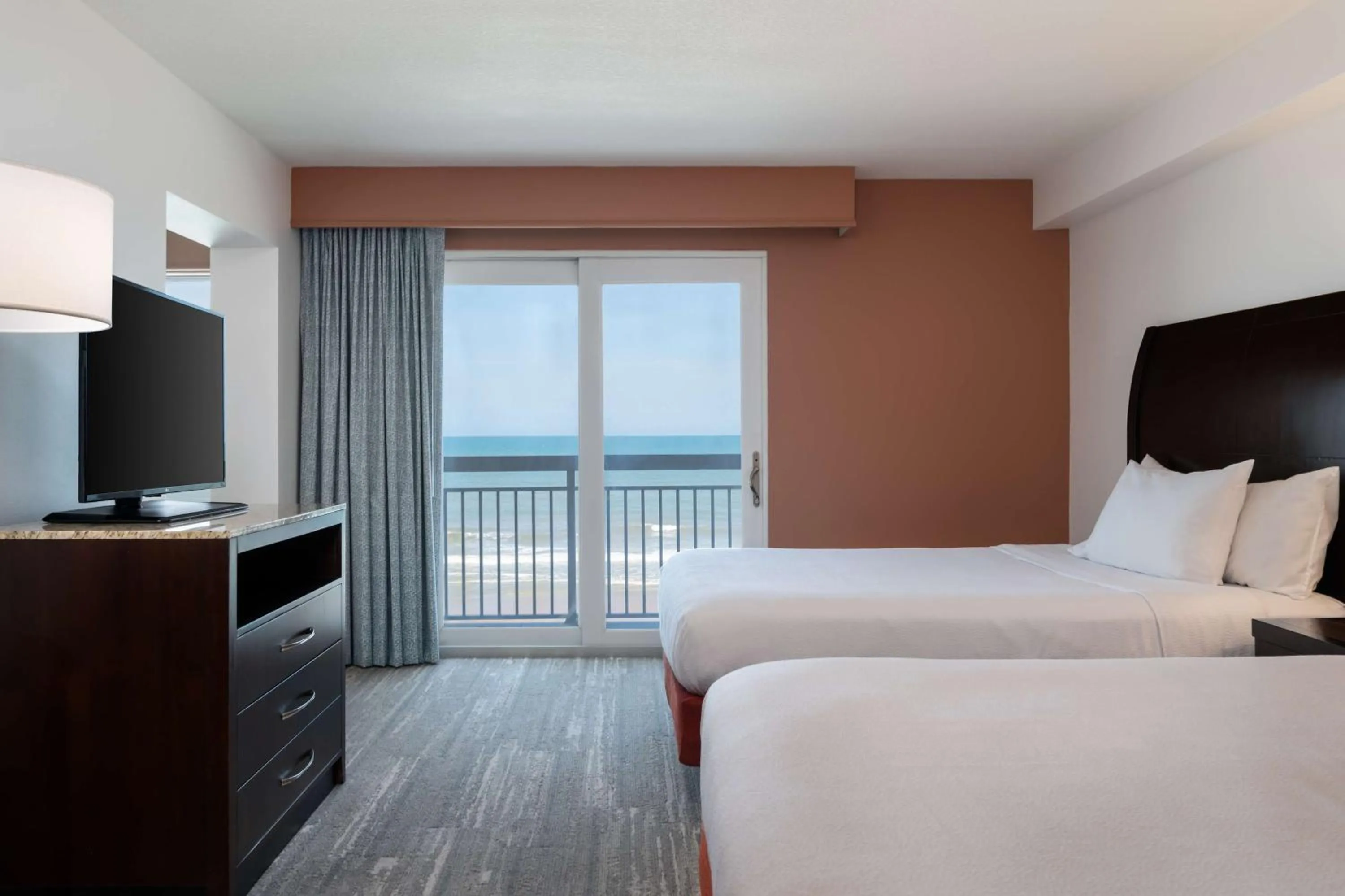 Deluxe Queen Room with Two Queen Beds and Balcony with Ocean-Front View in Hilton Garden Inn Daytona Beach Oceanfront