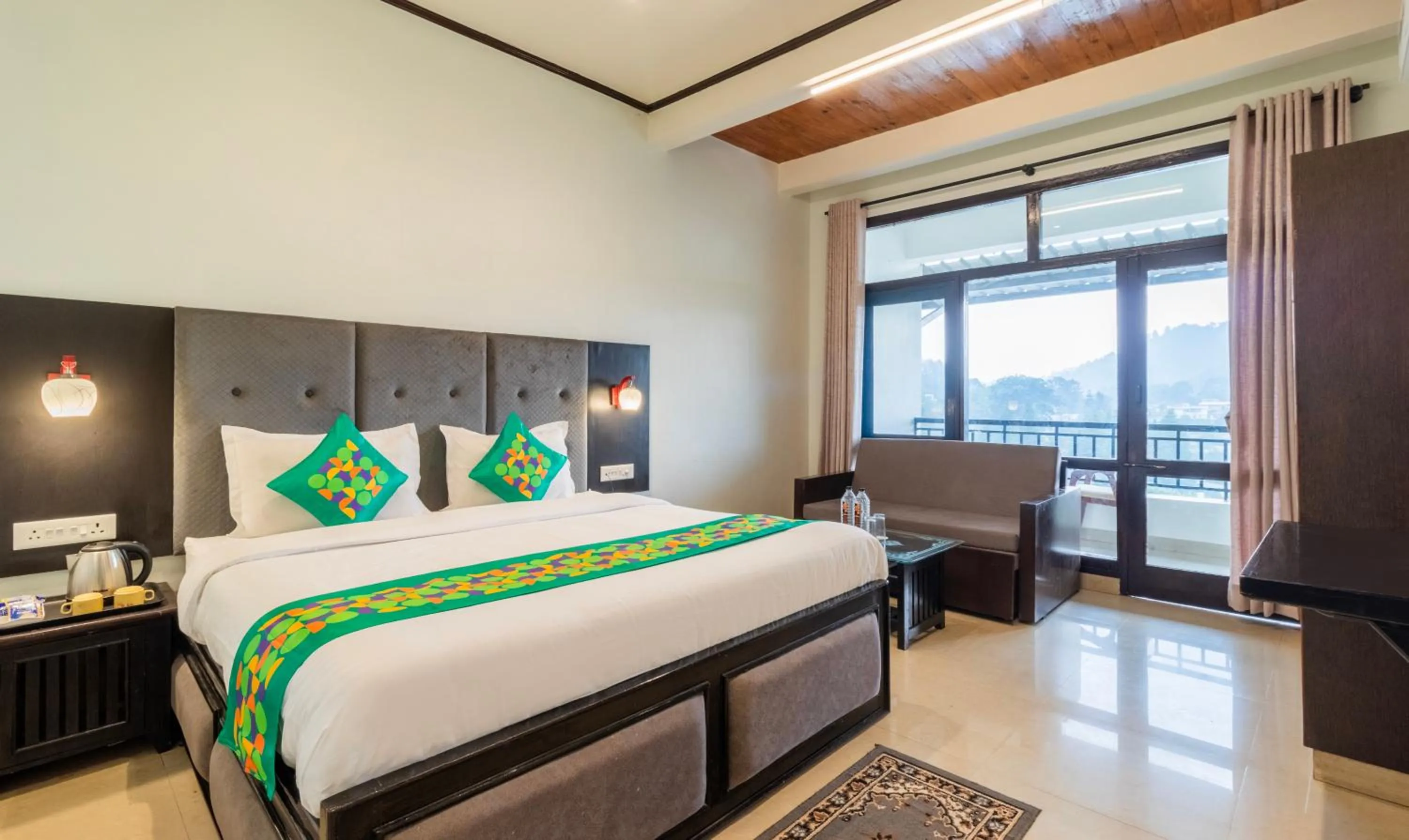 Deluxe Room with Balcony and Mountain View - single occupancy in Treebo Spring Birds - Kainchi Dham