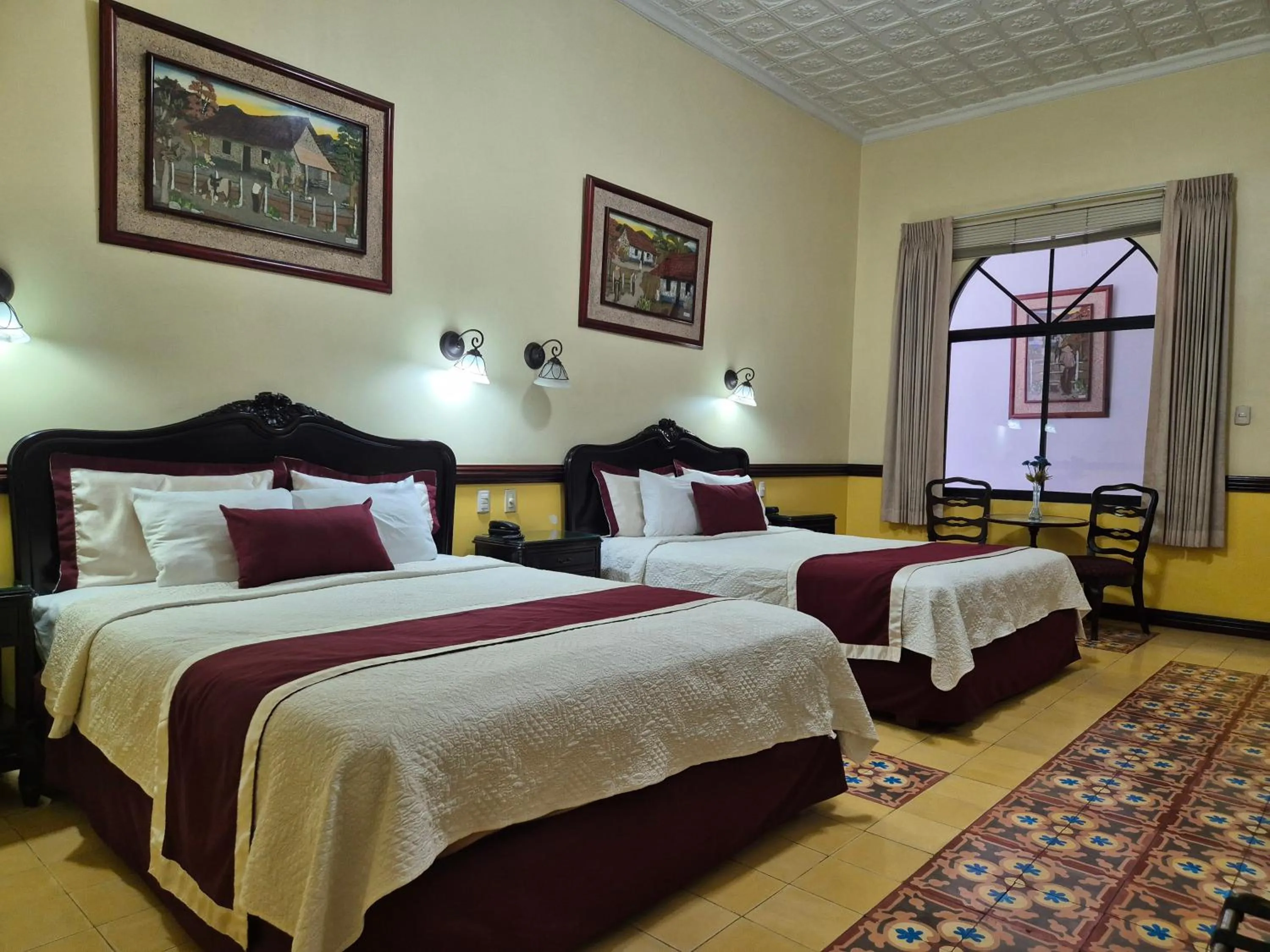 Deluxe Queen Room with Two Queen Beds in Hotel Santo Tomas / Historical Property