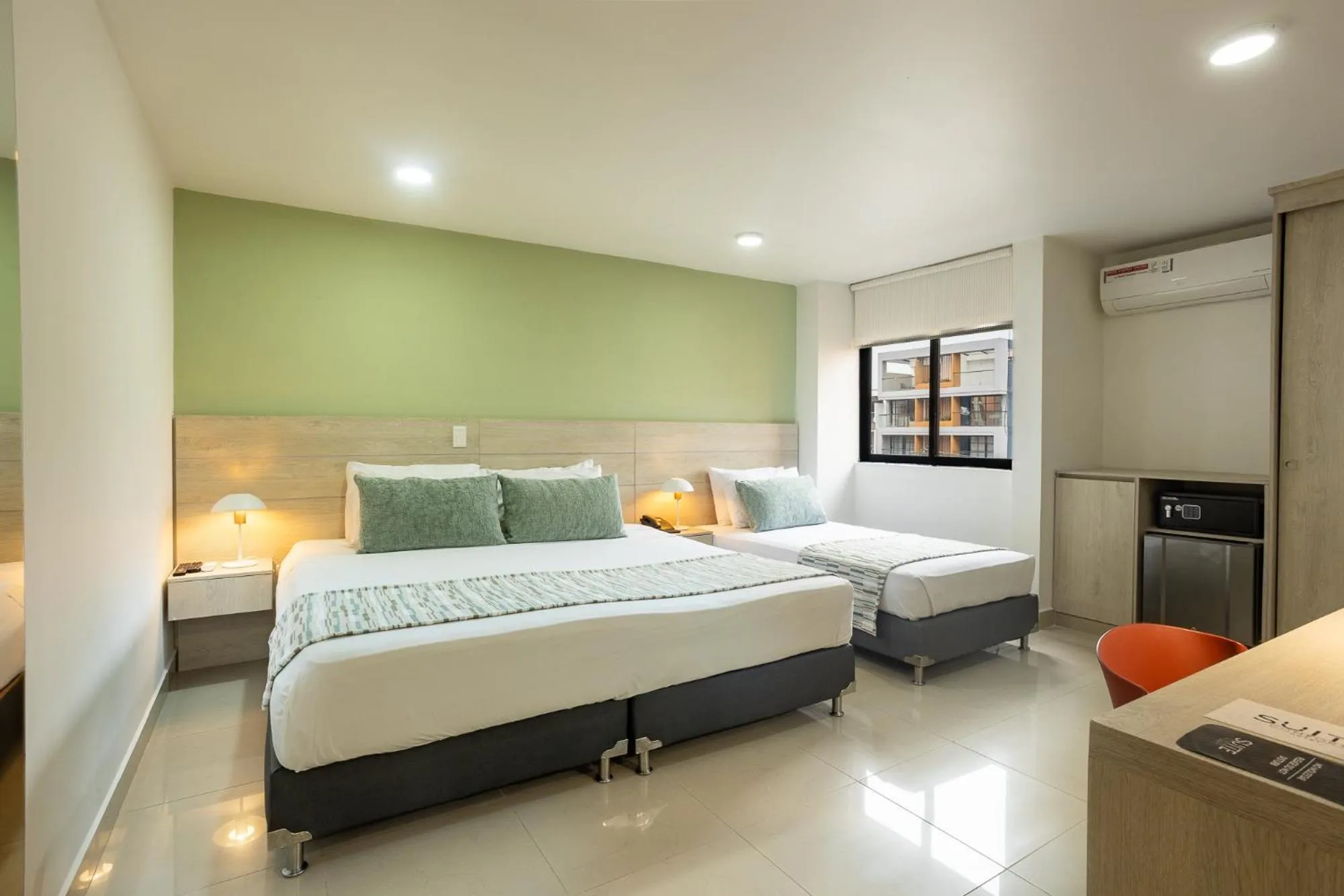 Triple Room in Hotel Suite Comfort