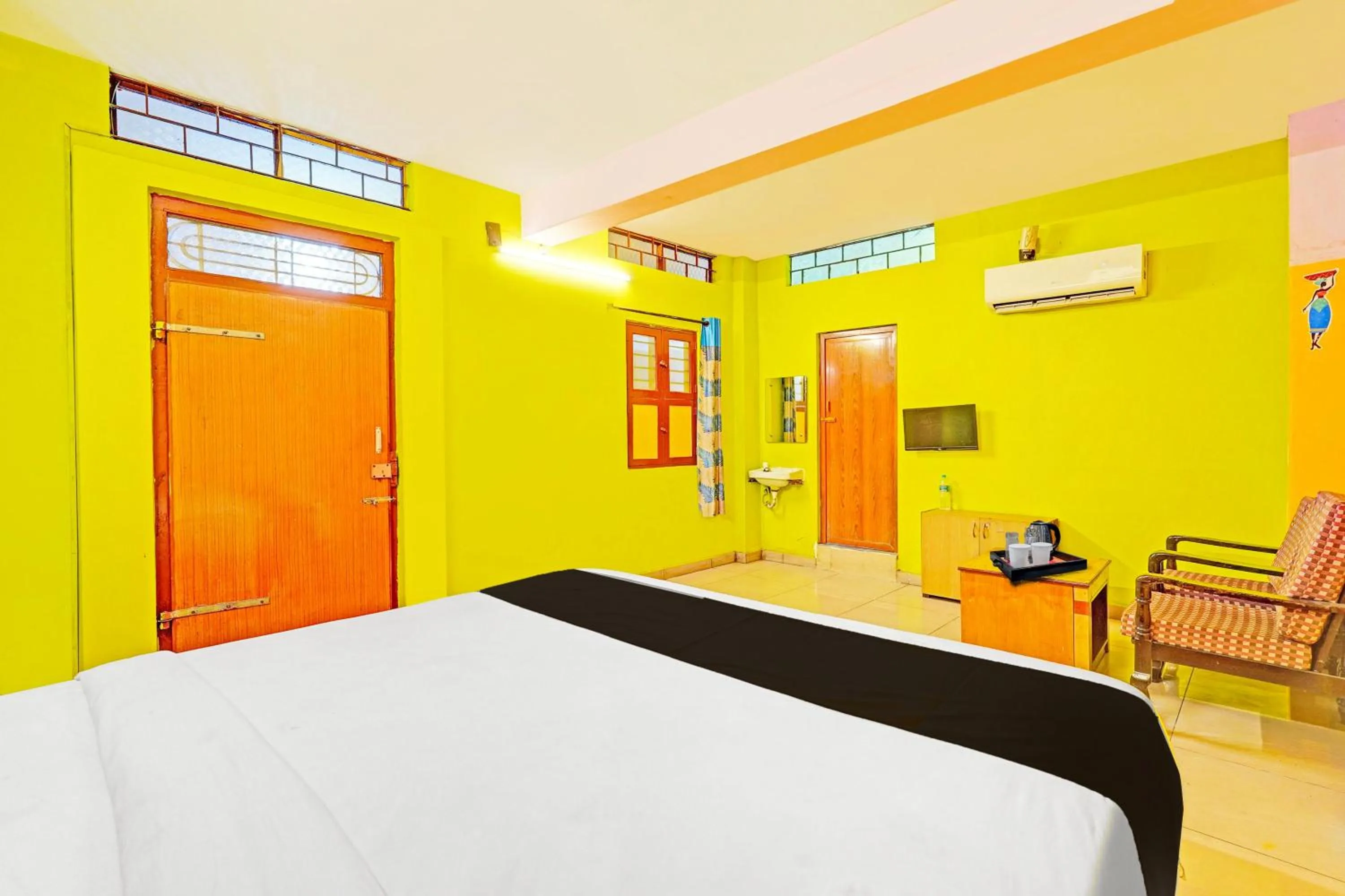 Classic Triple Room - single occupancy in Super Hotel O Thavalakuppam Near Bus Stand