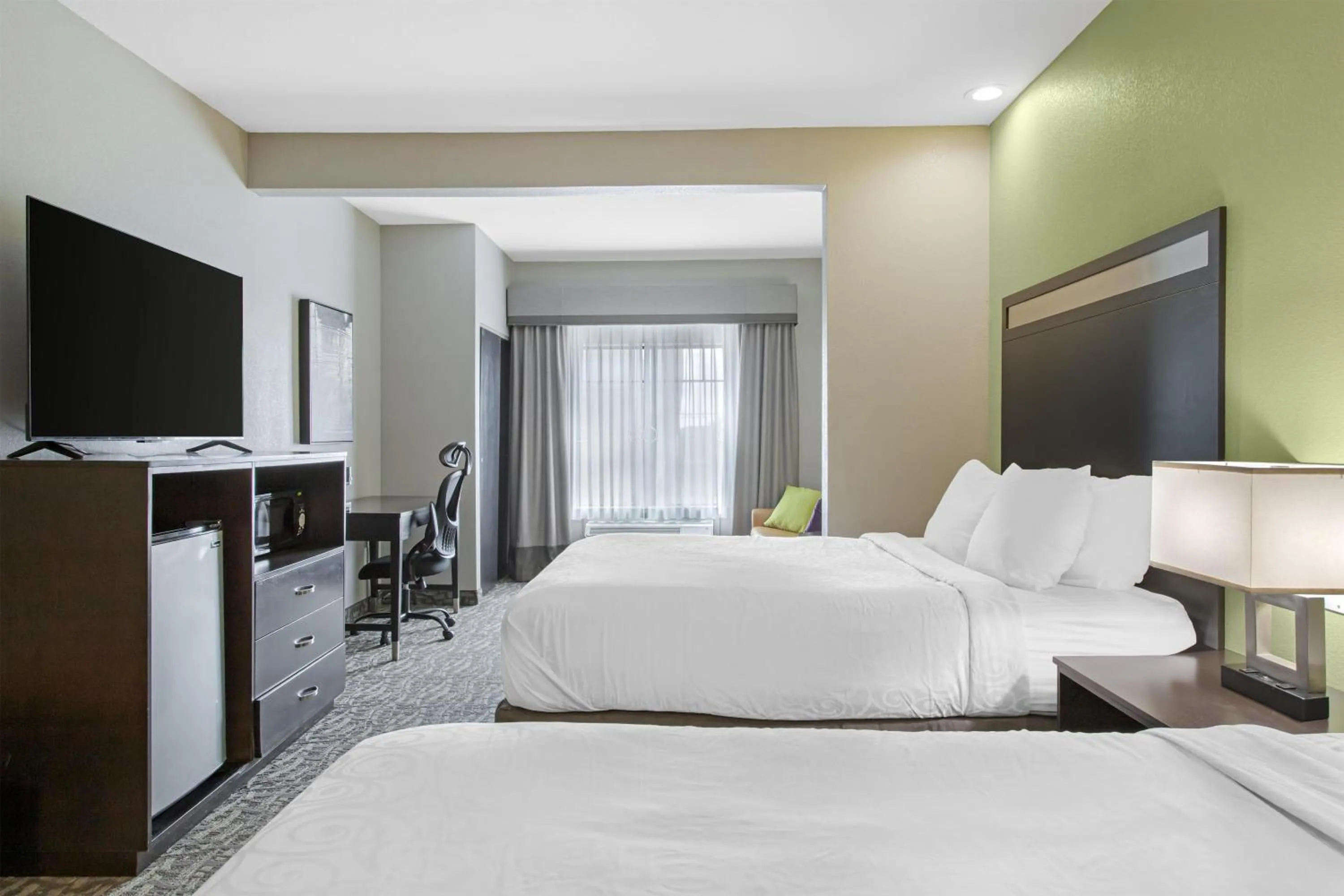 Queen Suite with Two Queen Beds and Sofa Bed in Best Western Plus Bay City Inn & Suites