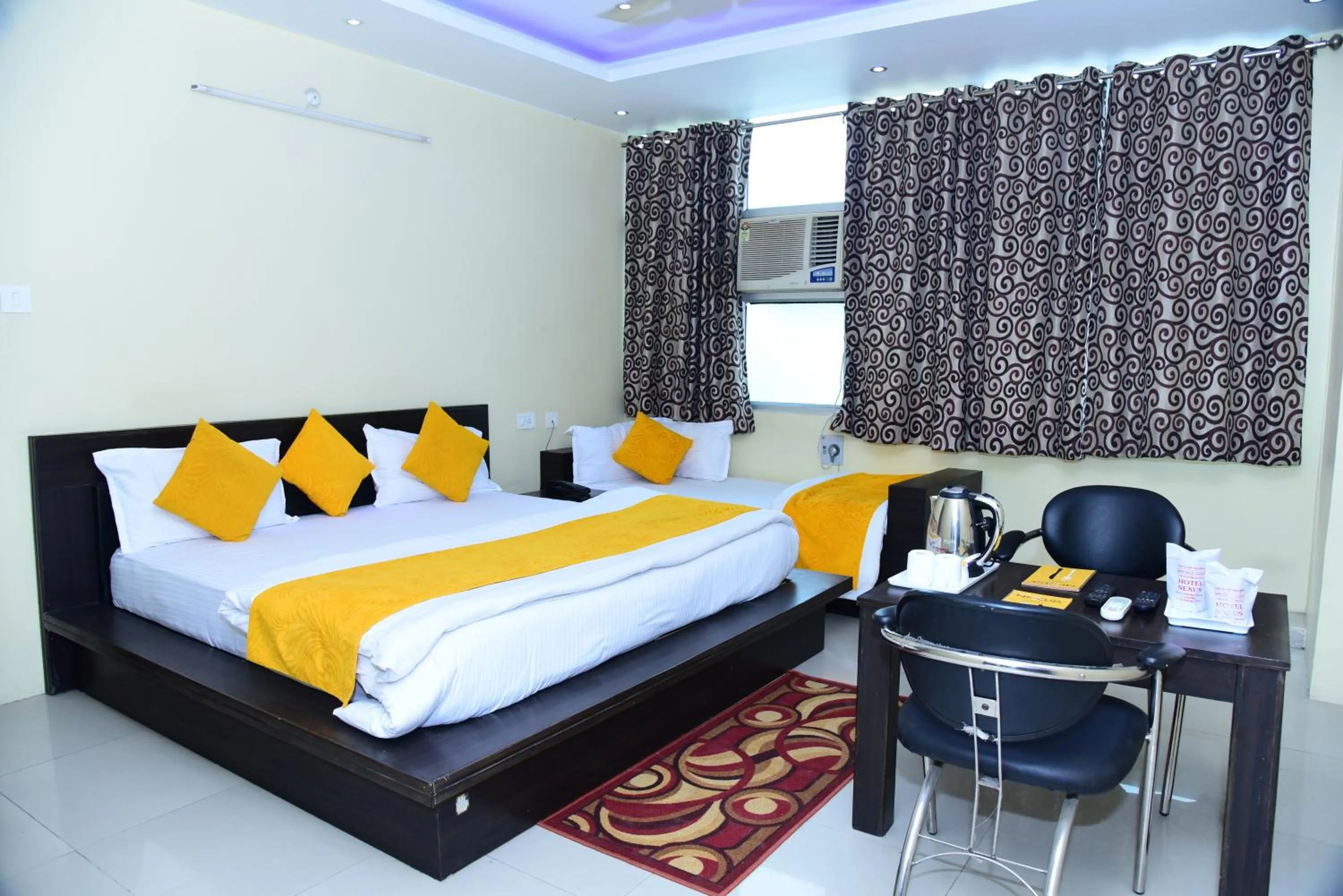 Triple Room with Private Bathroom in Hotel Nexus l Hotels In Charbagh Lucknow