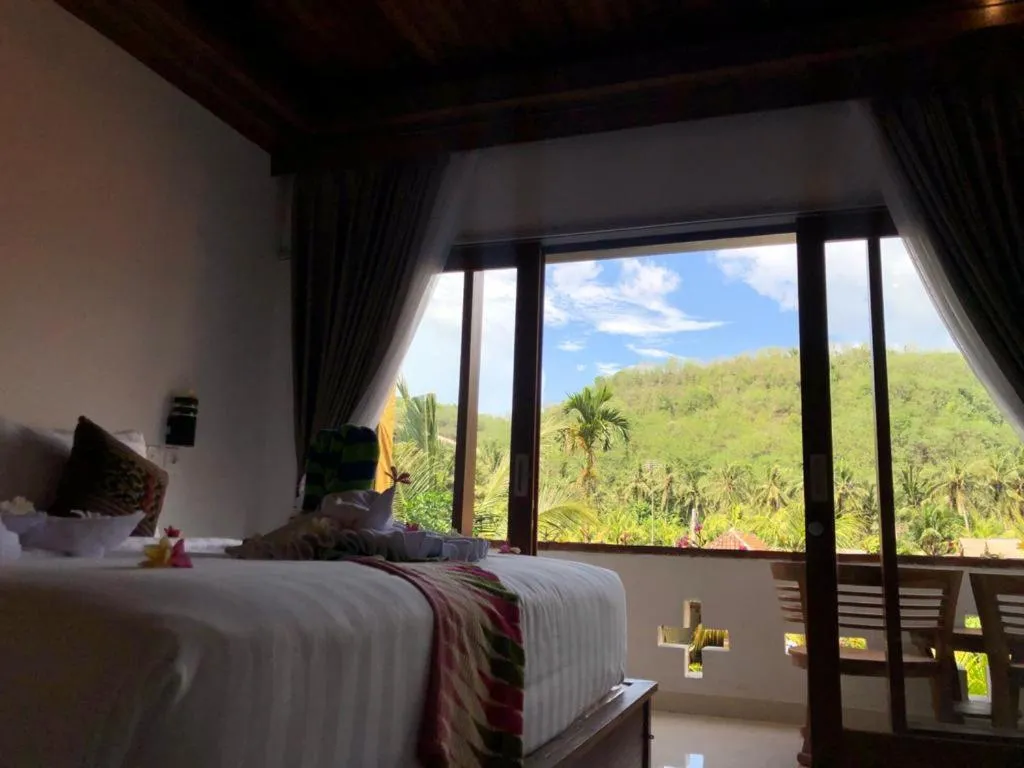Deluxe Double Room with Pool View in Crystal Bay Bungalows