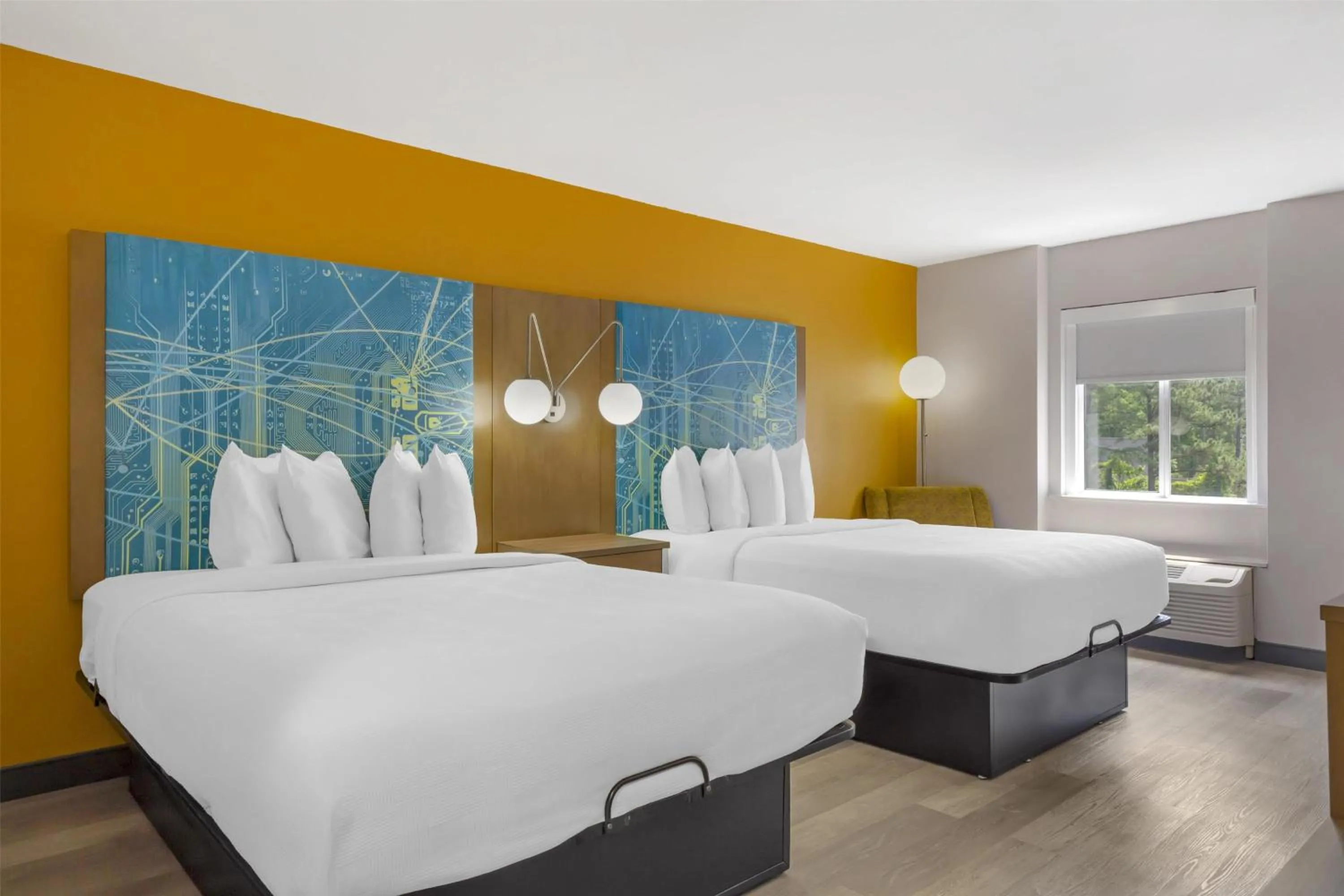 Queen Suite with Two Queen Beds and Sofa Bed in Best Western Plus Raleigh Crabtree Valley Hotel