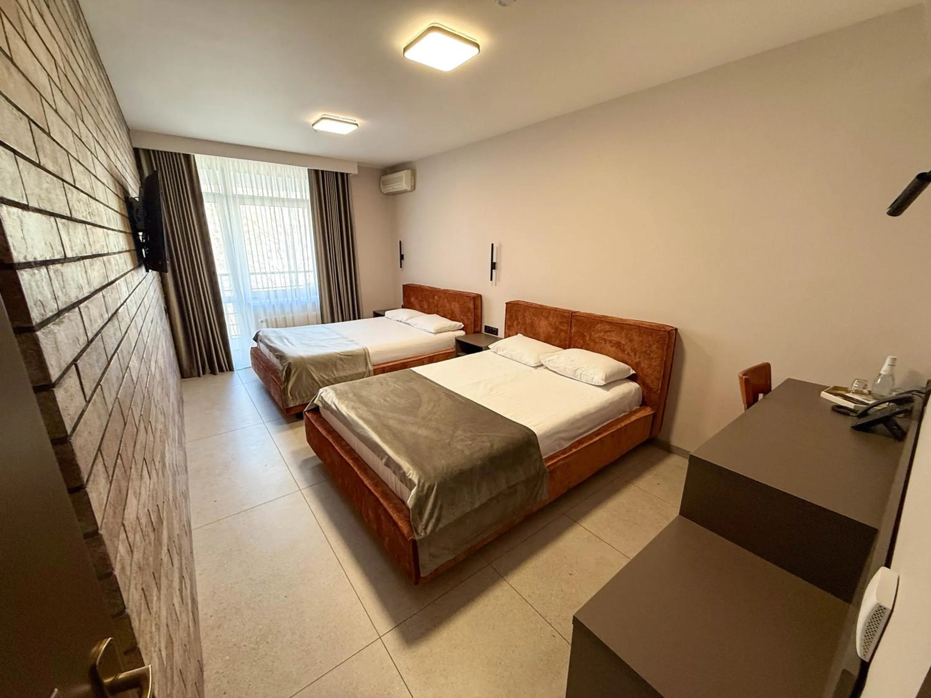 Standard Twin Room - single occupancy in Komilfo Hotel