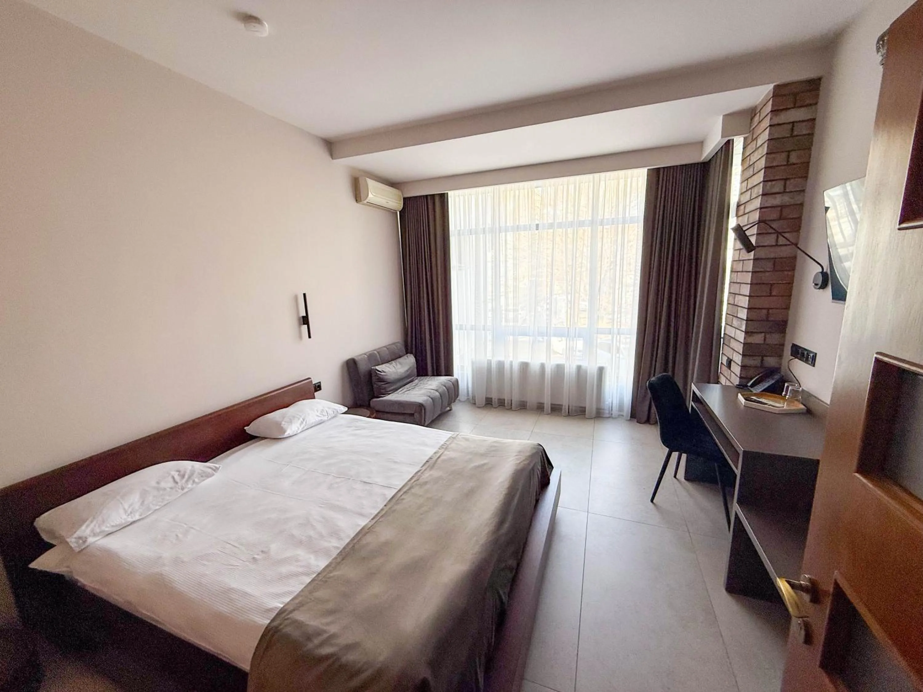 Junior Suite with Balcony - single occupancy in Komilfo Hotel