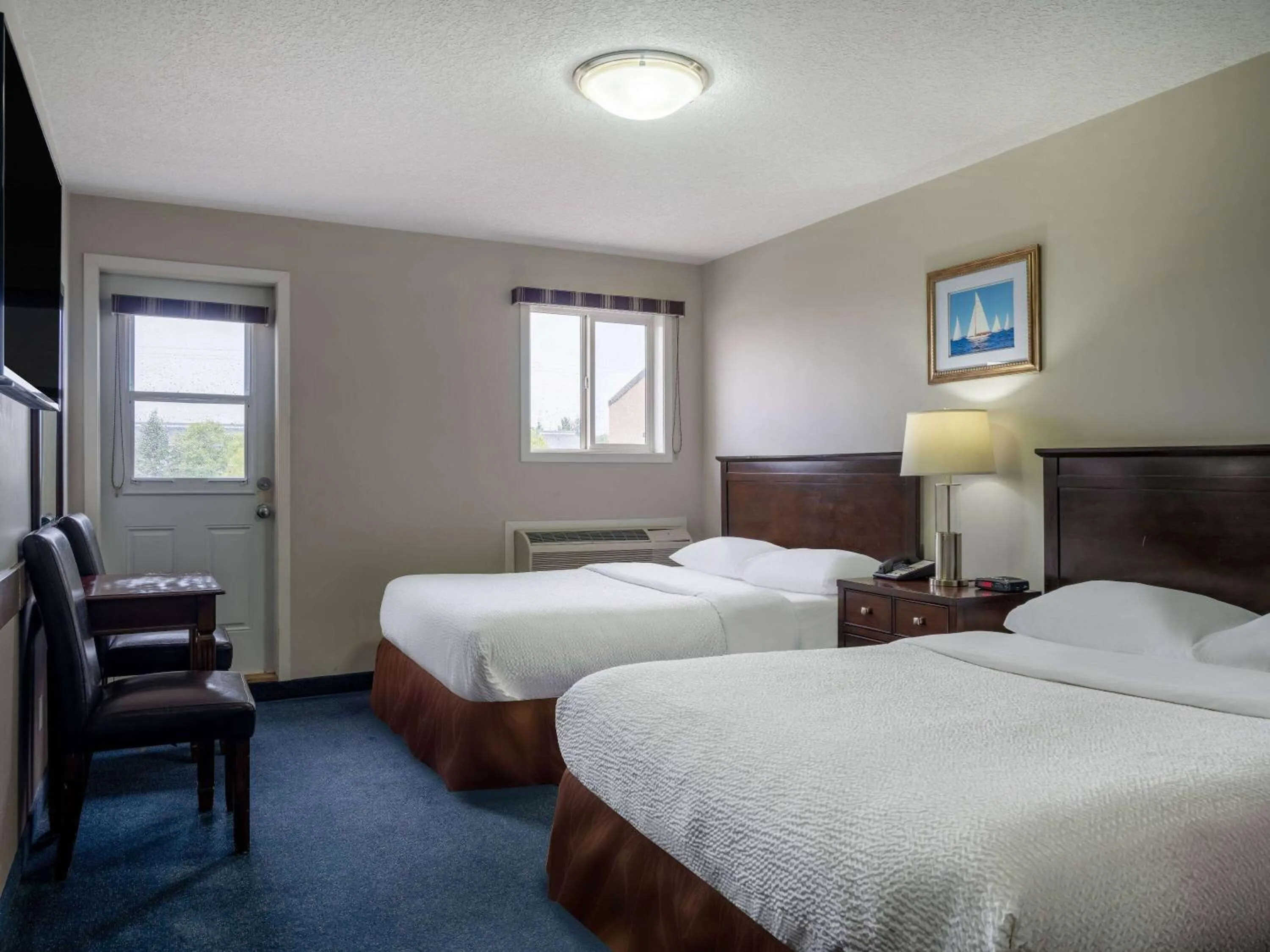 Queen Room with Two Queen Beds - Non-Smoking in Travelodge by Wyndham Wetaskiwin
