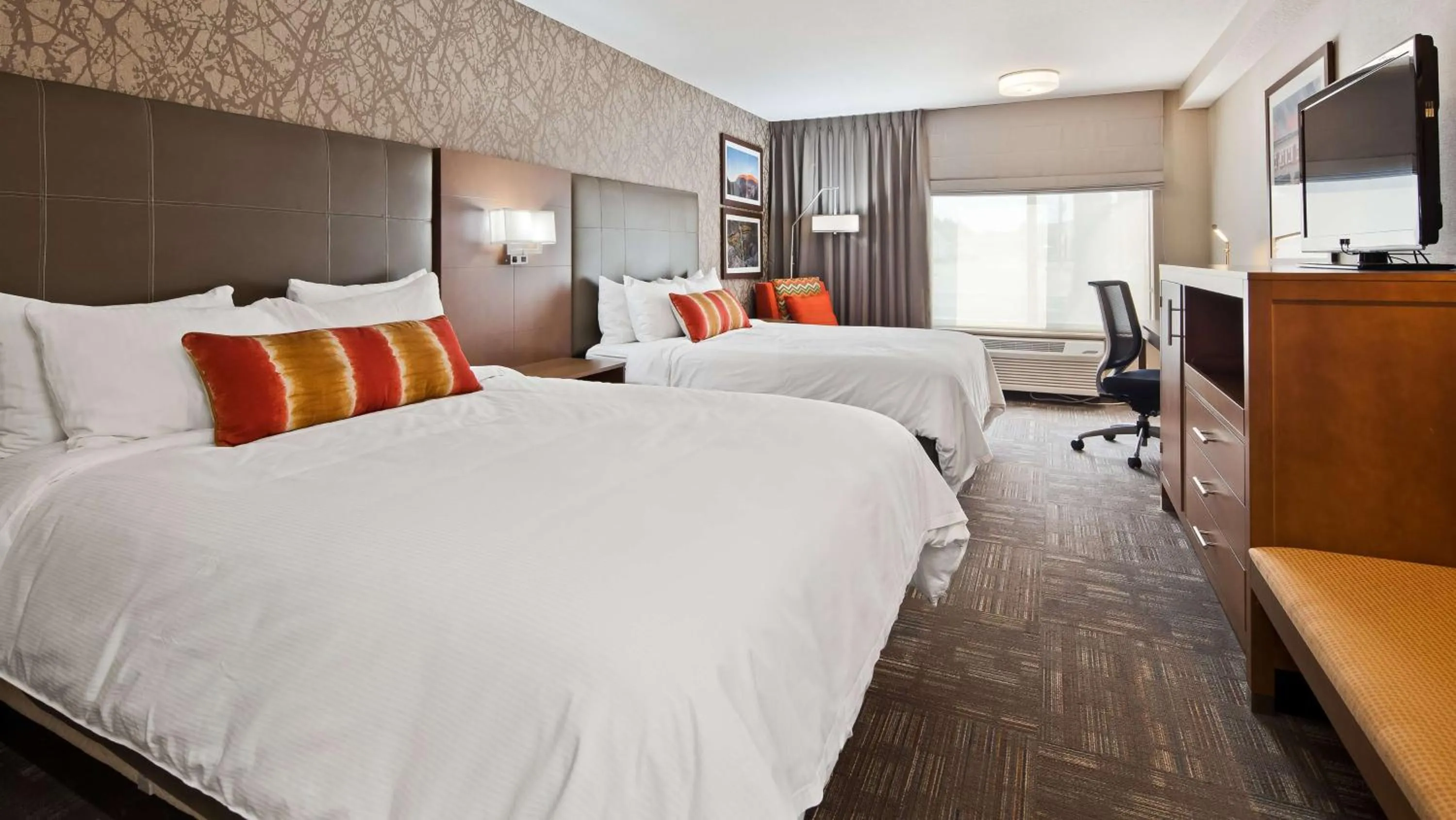 Queen Room with Two Queen Beds - Pet Friendly in Best Western Plus CottonTree Inn