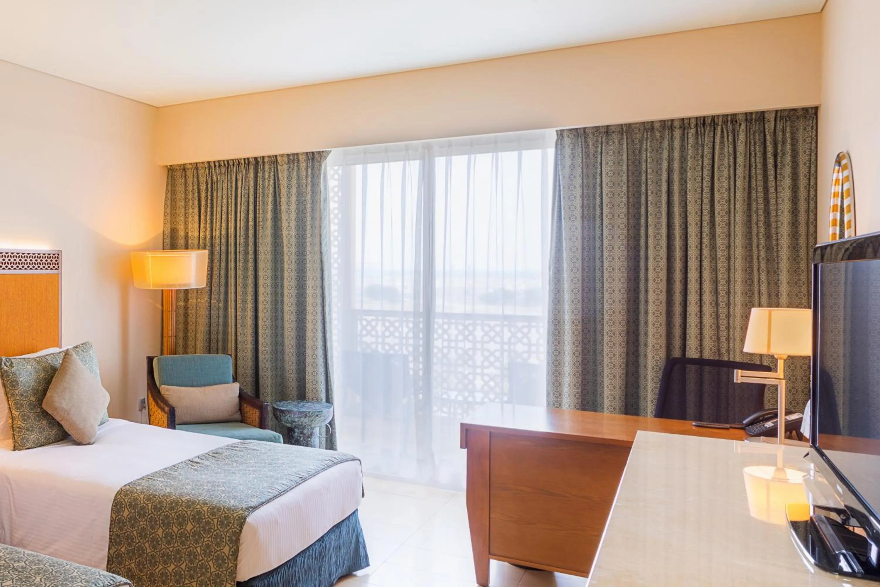 Deluxe Garden View Room (2 Adults + 1 Child) in Barceló Mussanah Resort, Sultanate of Oman