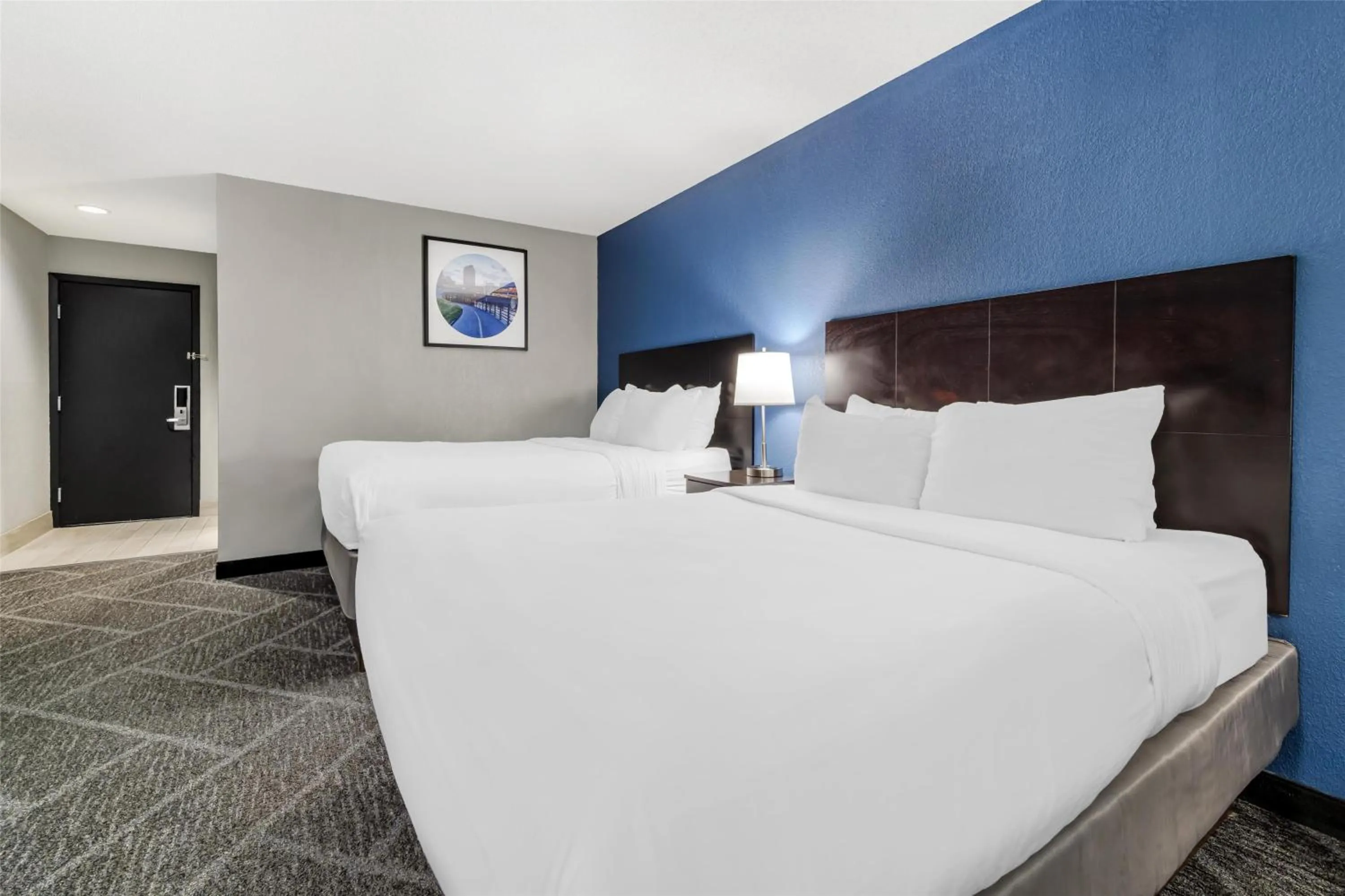 Queen Room with Two Queen Beds and Word Desk - Pool View in Best Western Rochester Hotel Mayo Clinic Area/ St. Mary's