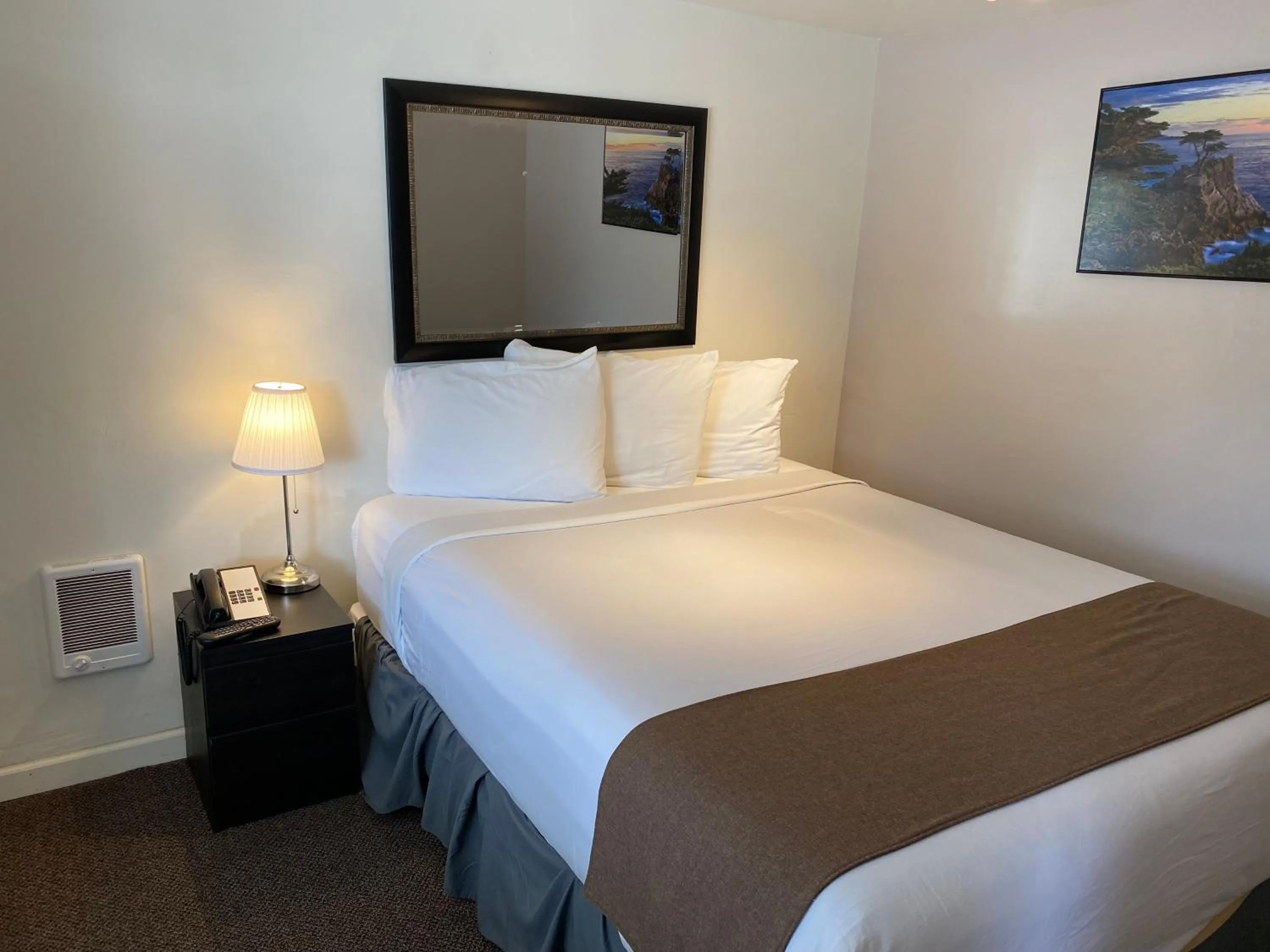 One Bedroom Queen Cottage with Fireplace & Kitchenette in Bide-A-Wee Inn and Cottages