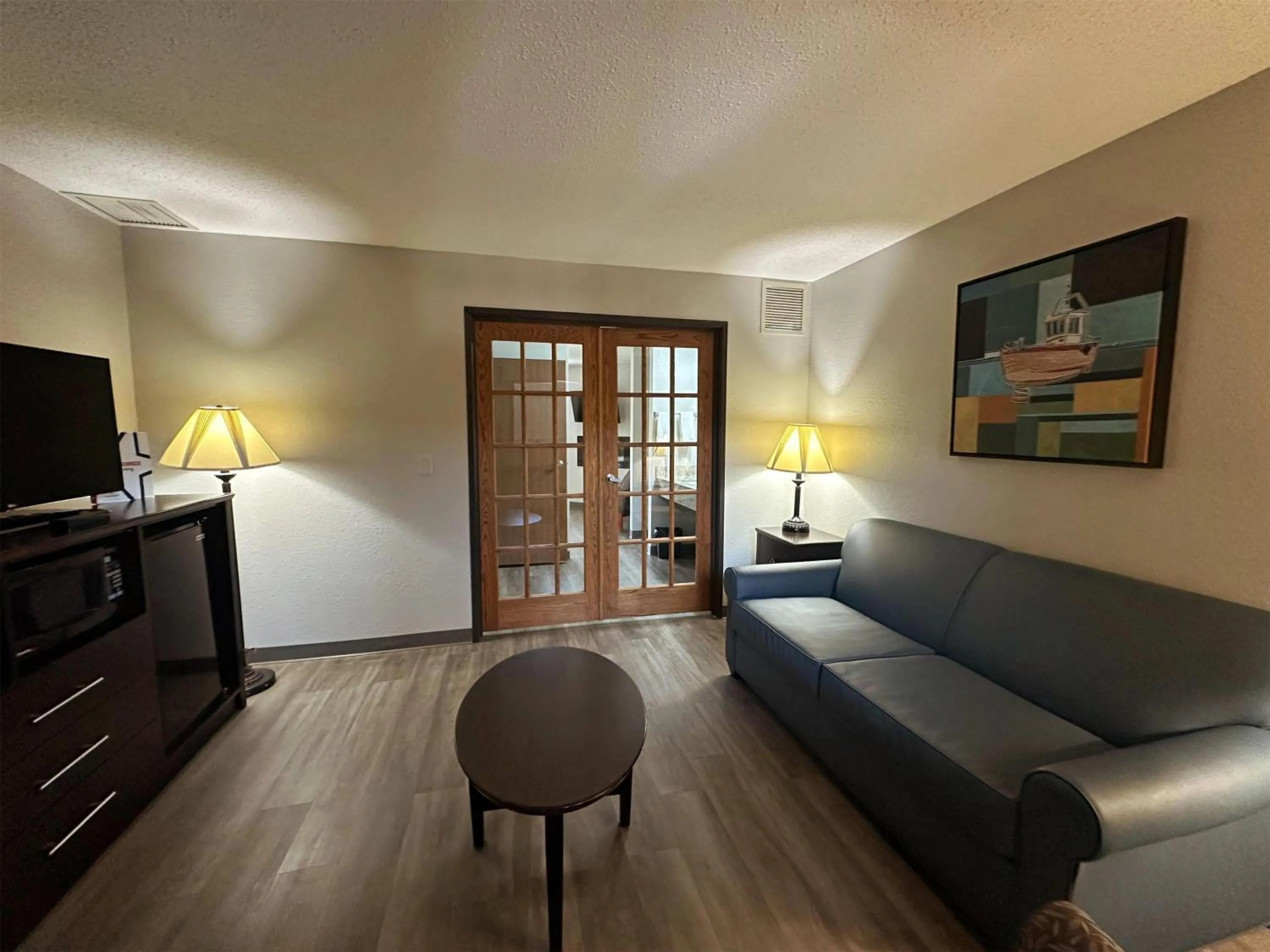 Deluxe King Suite - Non-Smoking in AmericInn by Wyndham Menominee