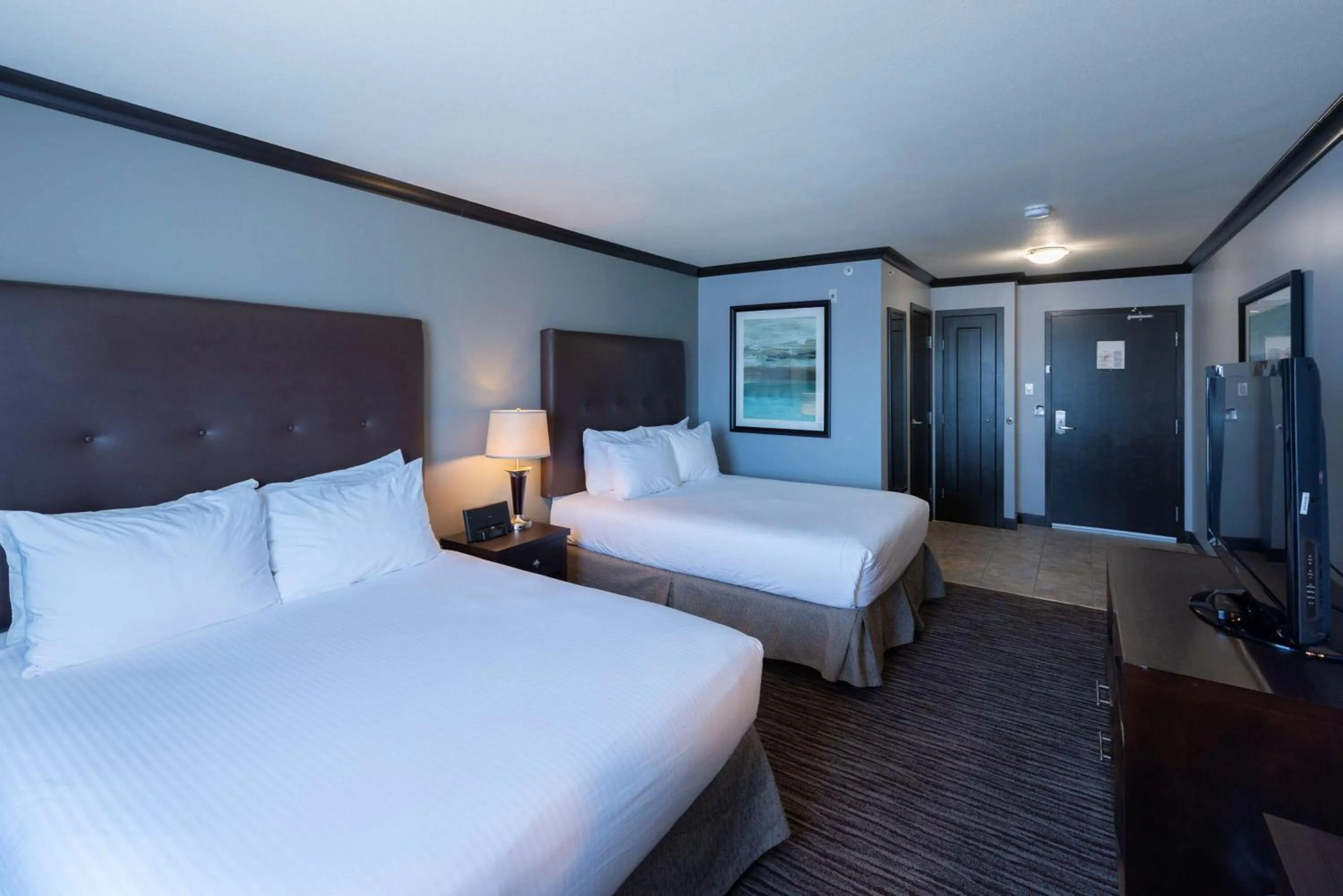 Queen Room with Two Queen Beds - single occupancy in Prestige Treasure Cove Resort
