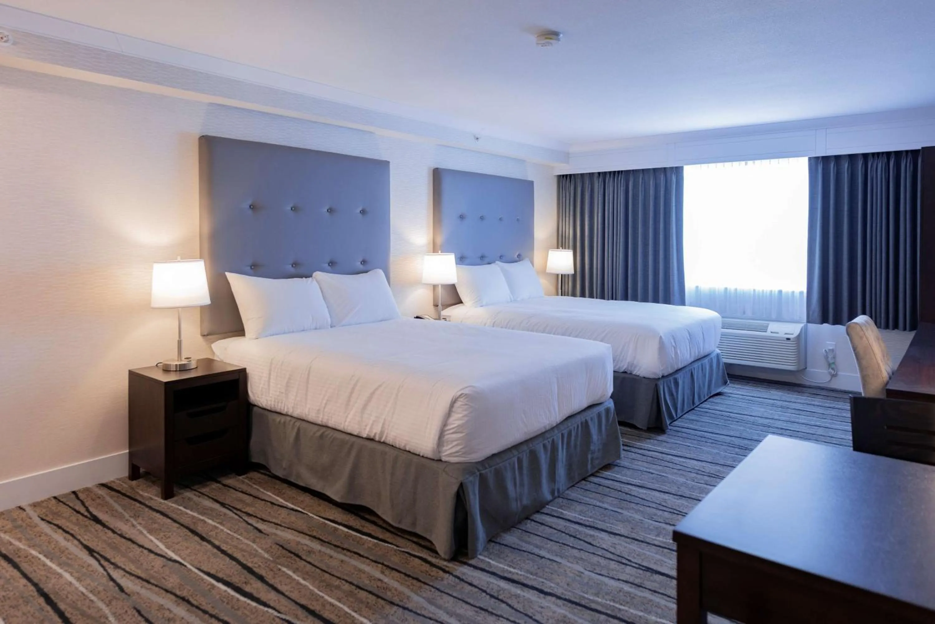 Executive Queen Suite with Two Queen Beds and Kitchen in Prestige Treasure Cove Resort