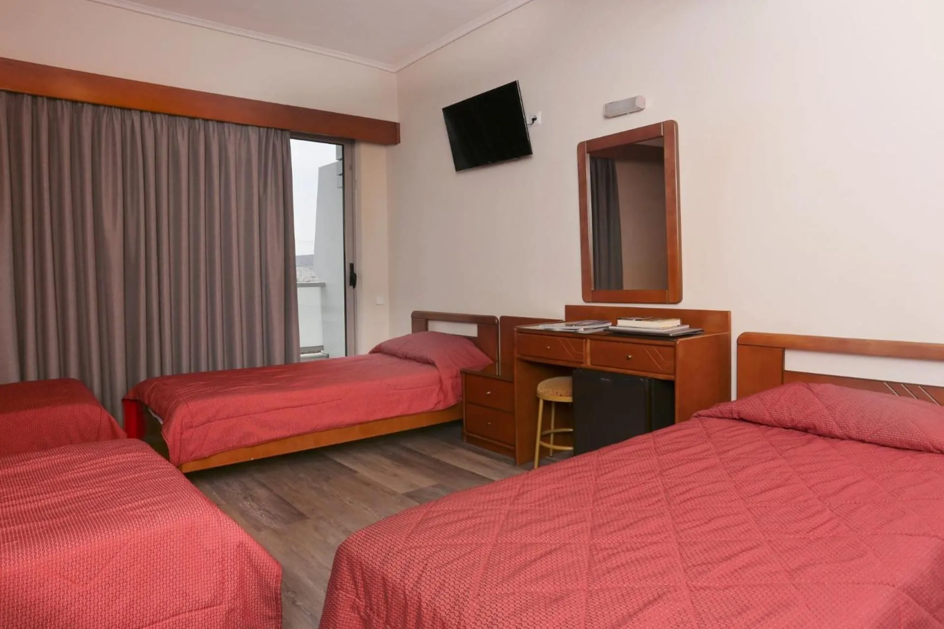 Standard Quadruple Room in Xenophon Hotel