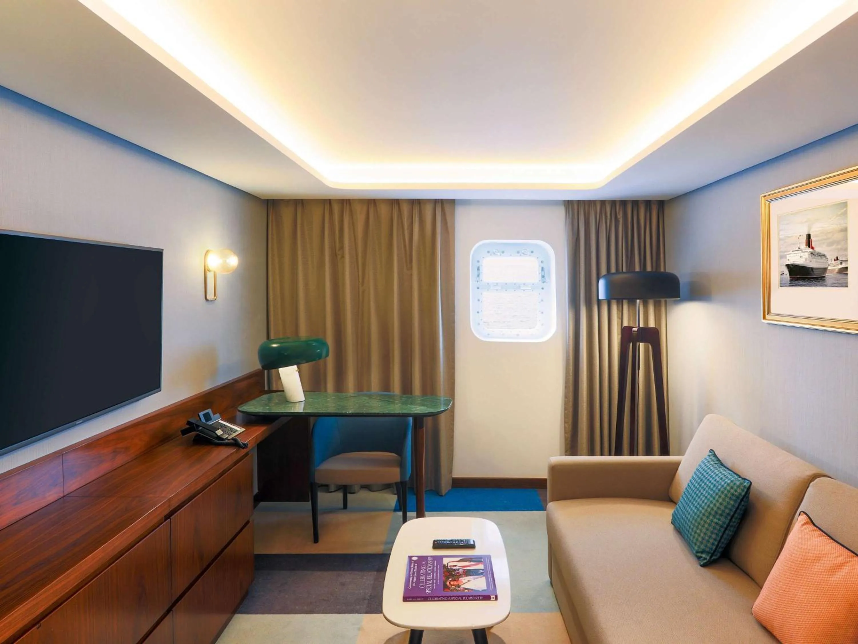 Officer Suite with One King Bed and Sofa Bed in Queen Elizabeth 2 Hotel