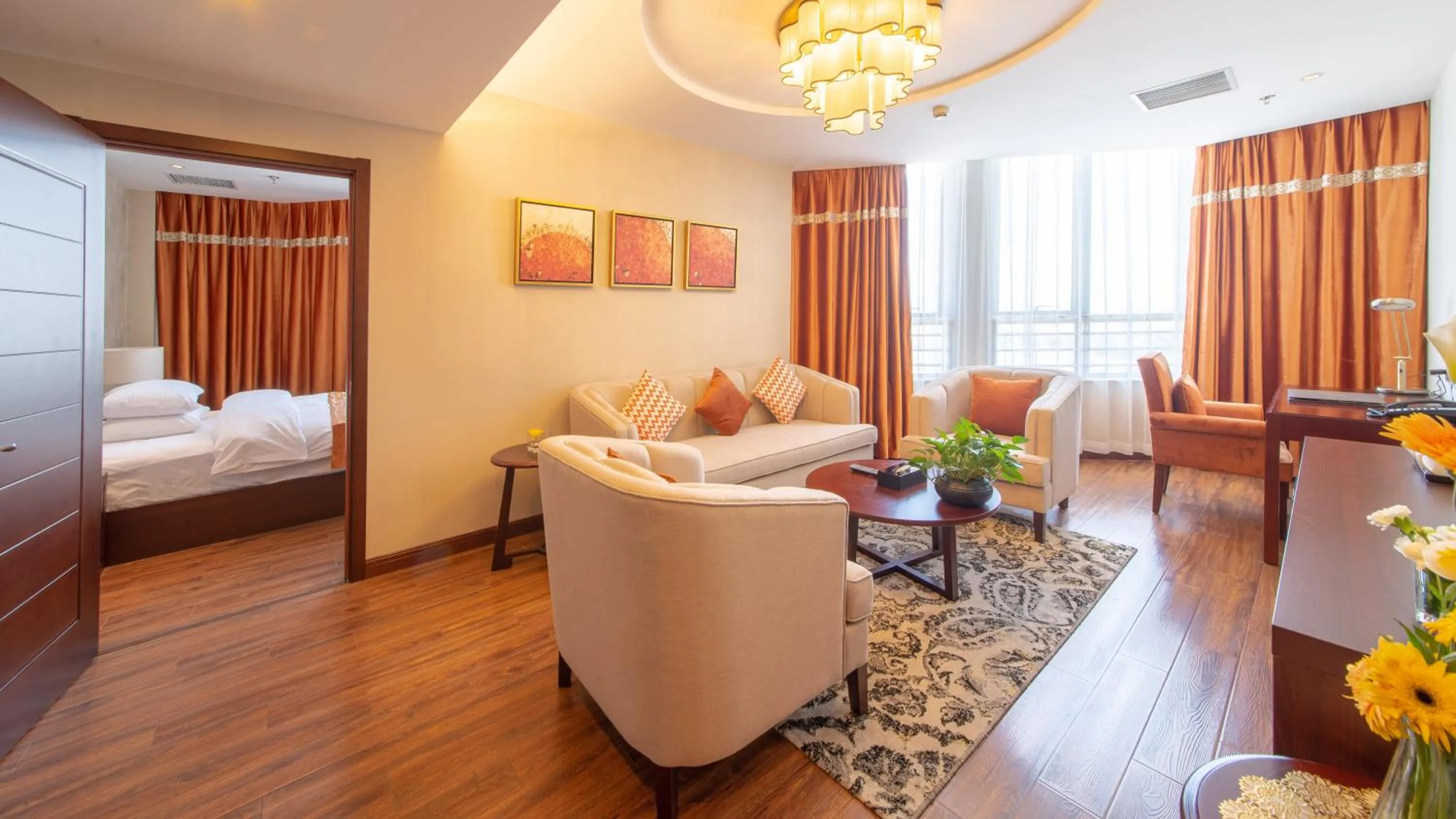 Living room, Bed in Beijing Sunflower Hotel--Beijing Universal Studios Resort