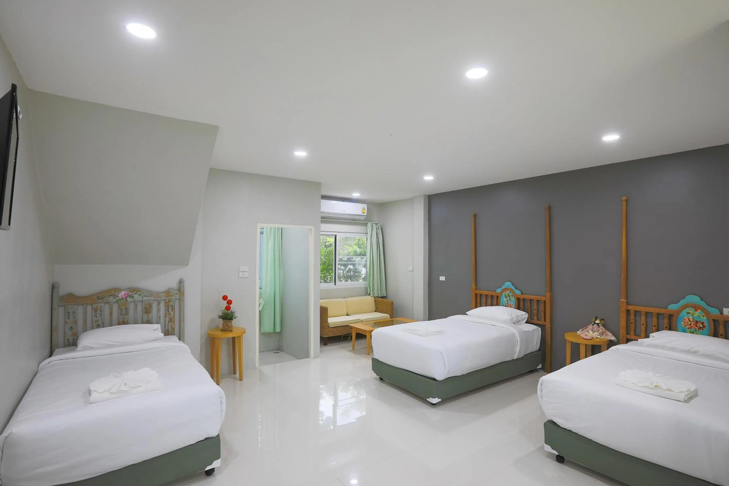 Deluxe Triple Room in Phuket Nonnita Boutique Resort - SHA Plus
