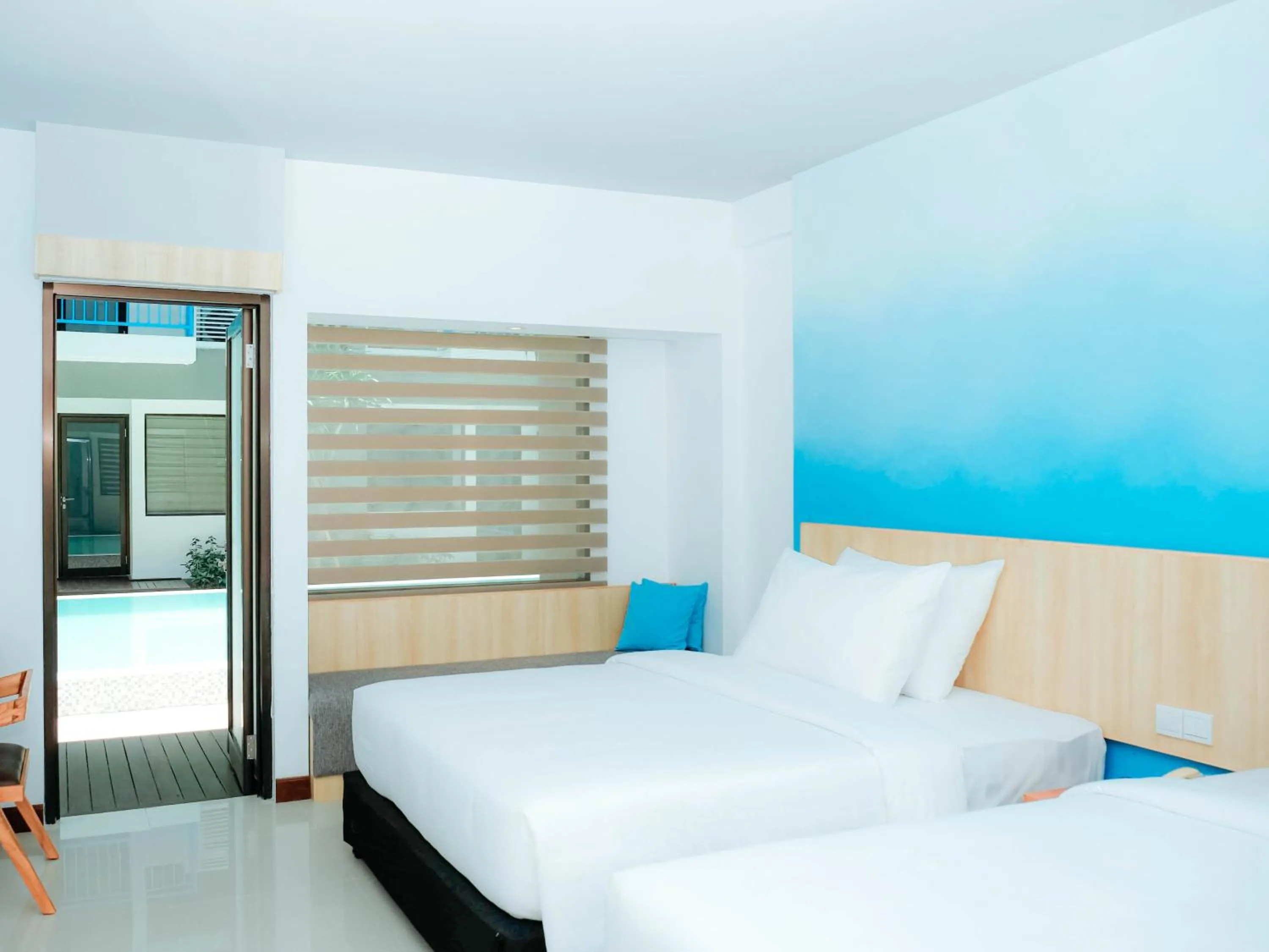 Deluxe Twin Room with Pool Access in Bloo Bali Hotel