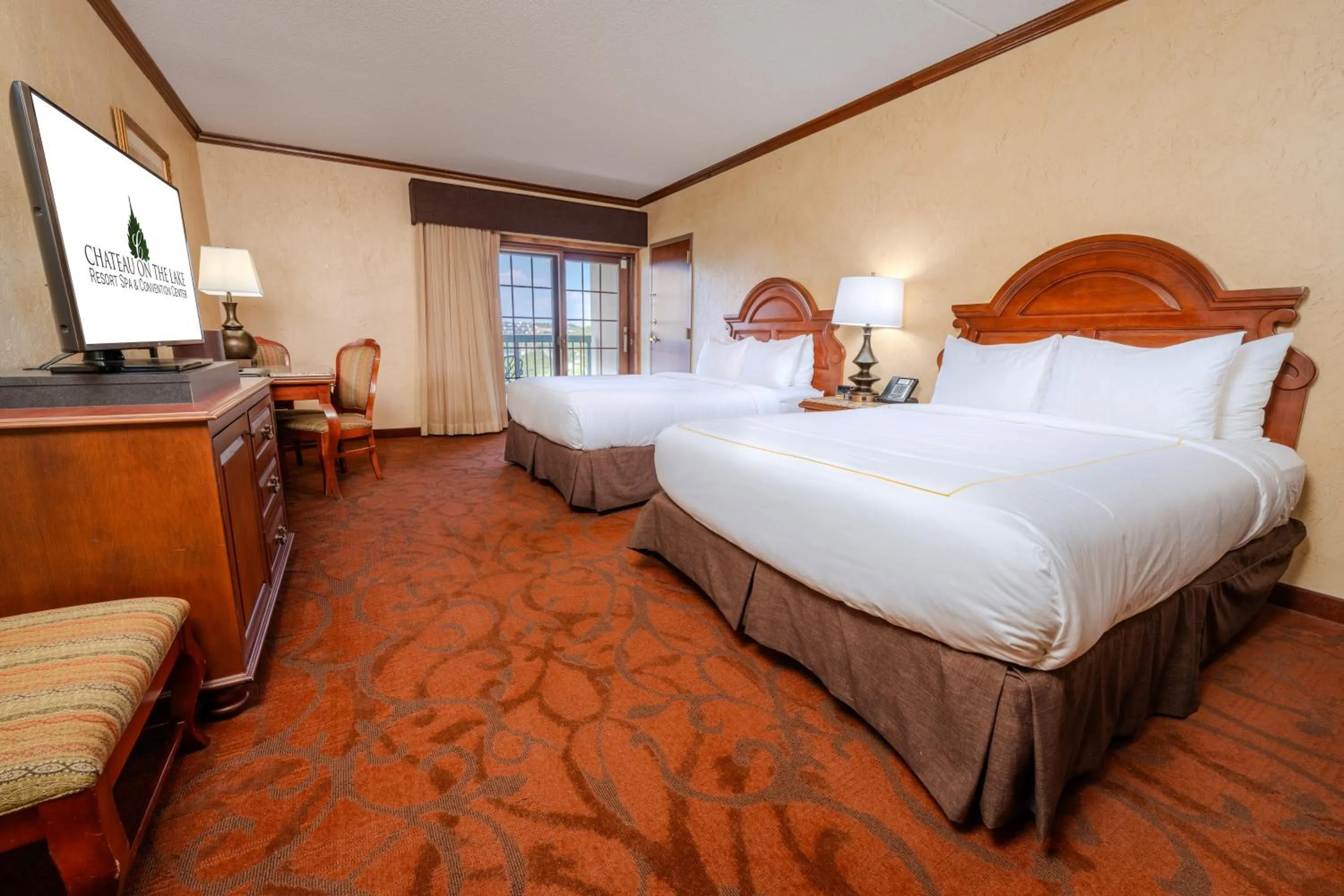 Deluxe Queen Room with Two Queen Beds in Chateau on the Lake Resort Spa and Convention Center