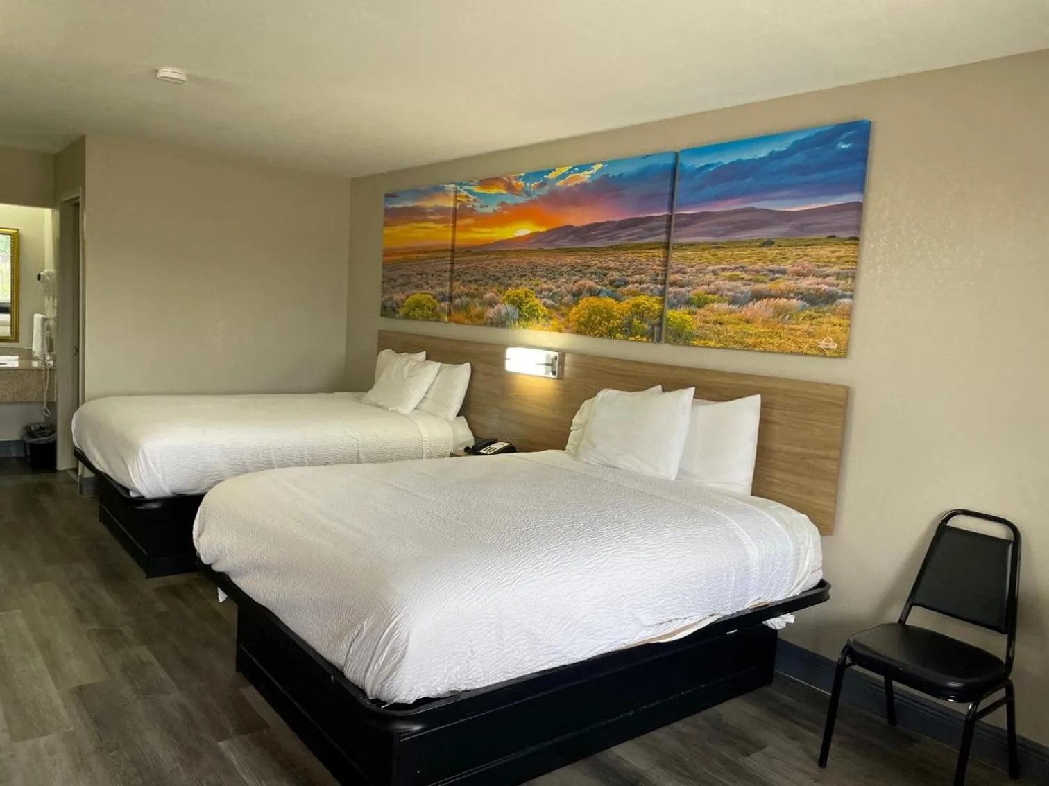 Queen Room with Two Queen Beds - Smoking in Days Inn by Wyndham San Antonio Southeast Frost Bank Center