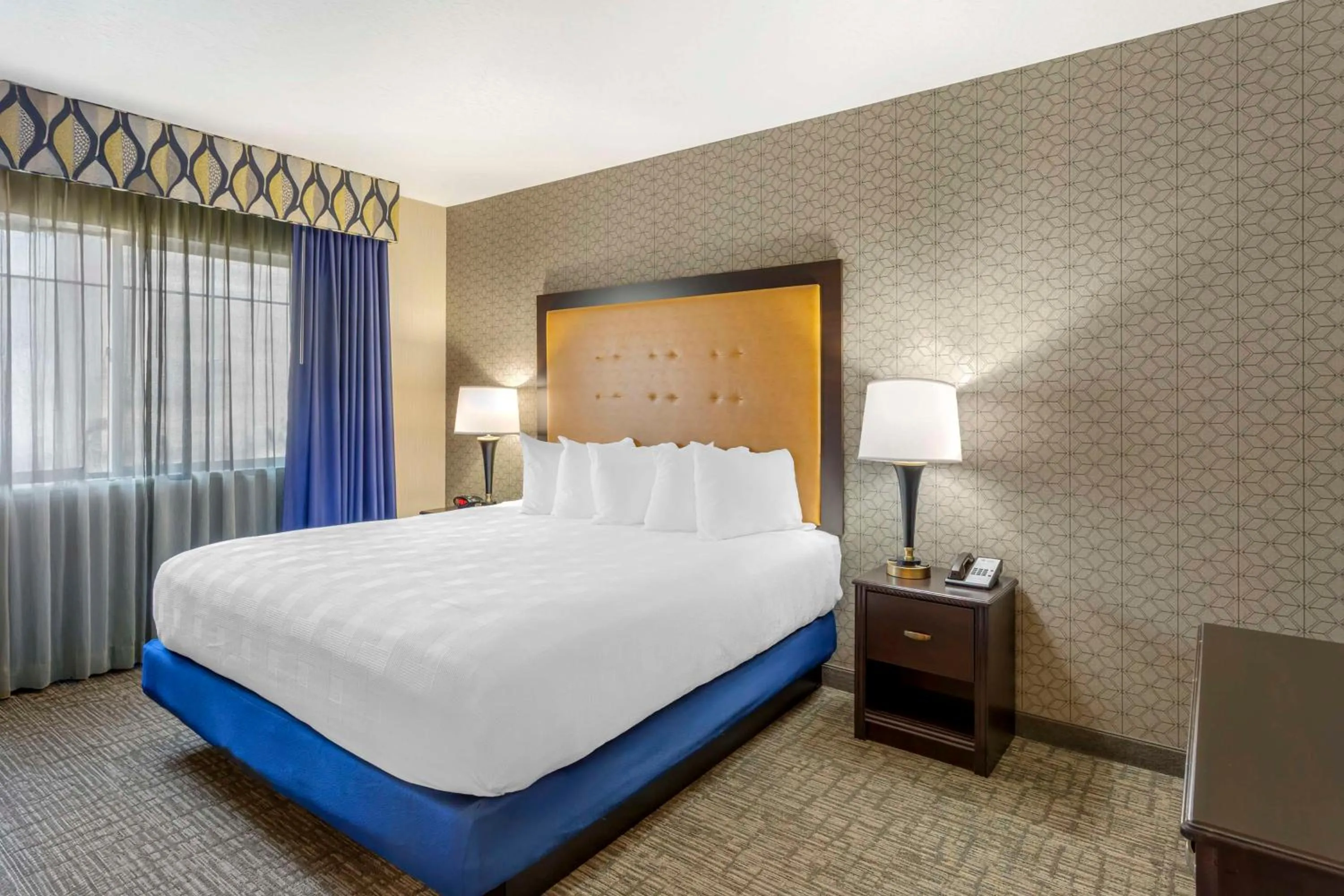 Suite with One King and One Queen Bed in Best Western Plus Grant Creek Inn