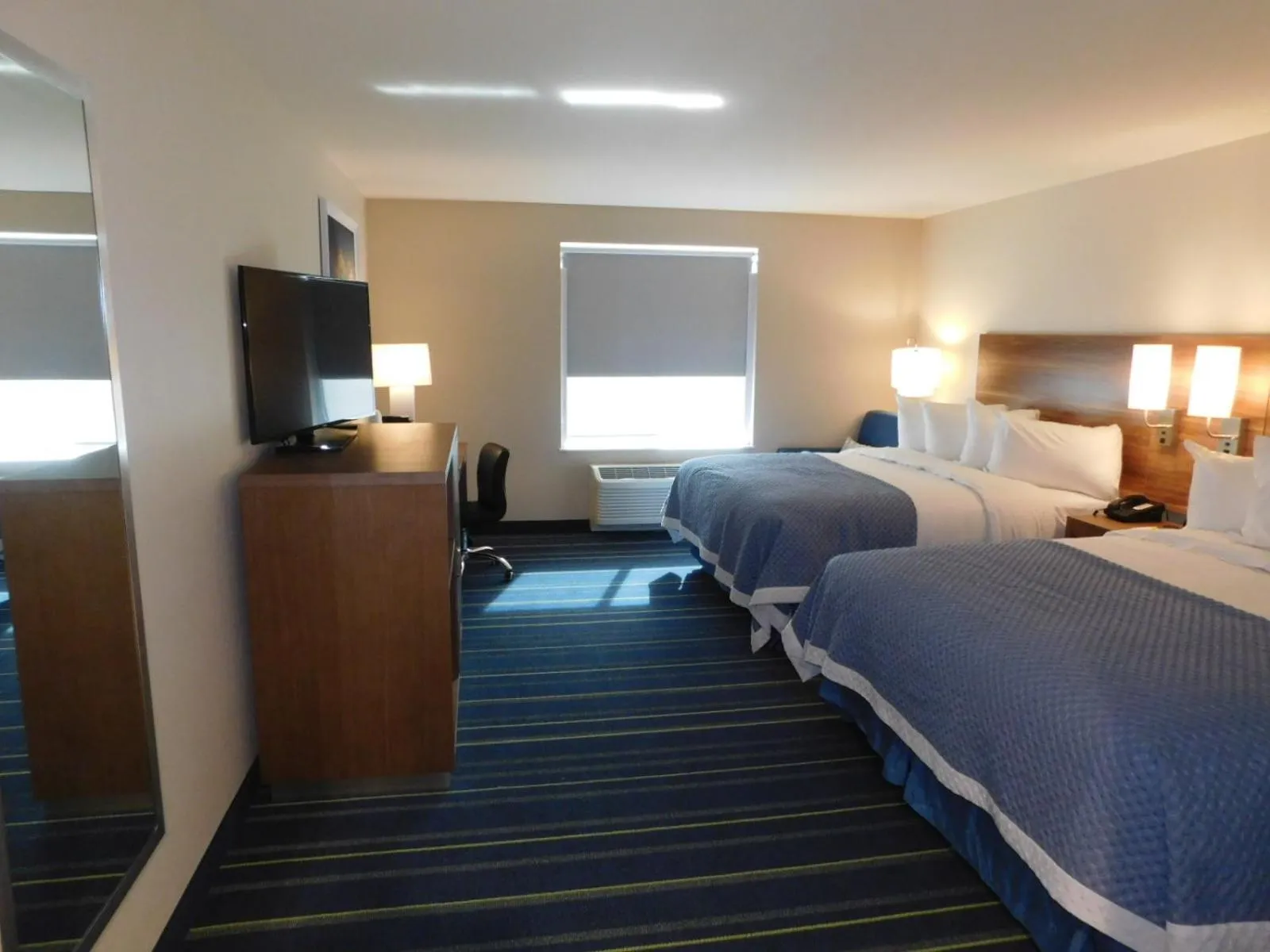 Queen Room with Two Queen Beds and Bath Tub with Grab Bars - Mobility Accessible/Non-Smoking in Days Inn & Suites by Wyndham Kearney NE