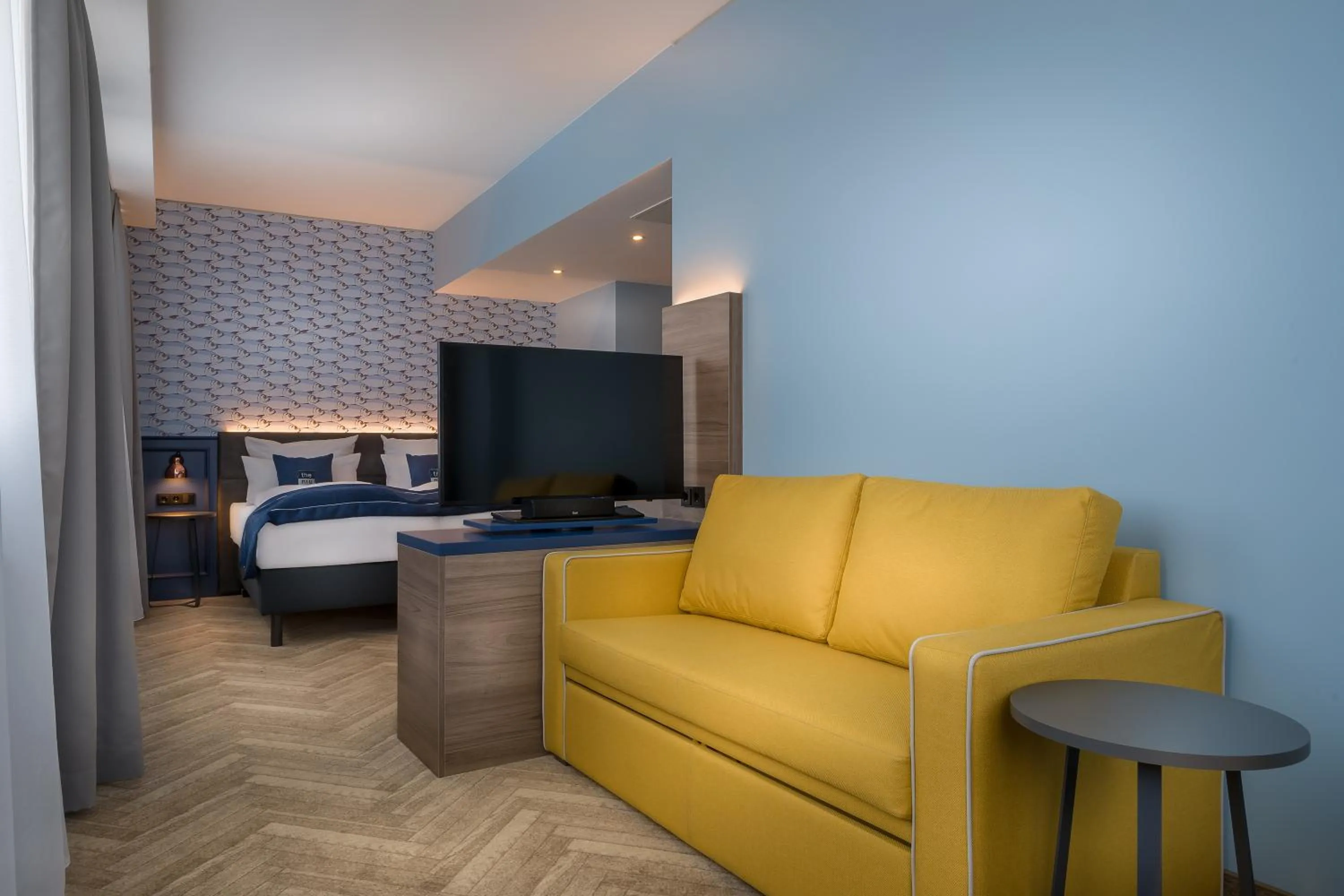 Premium Queen room with single sofa bed in Holiday Inn - the niu, Welly Kiel by IHG