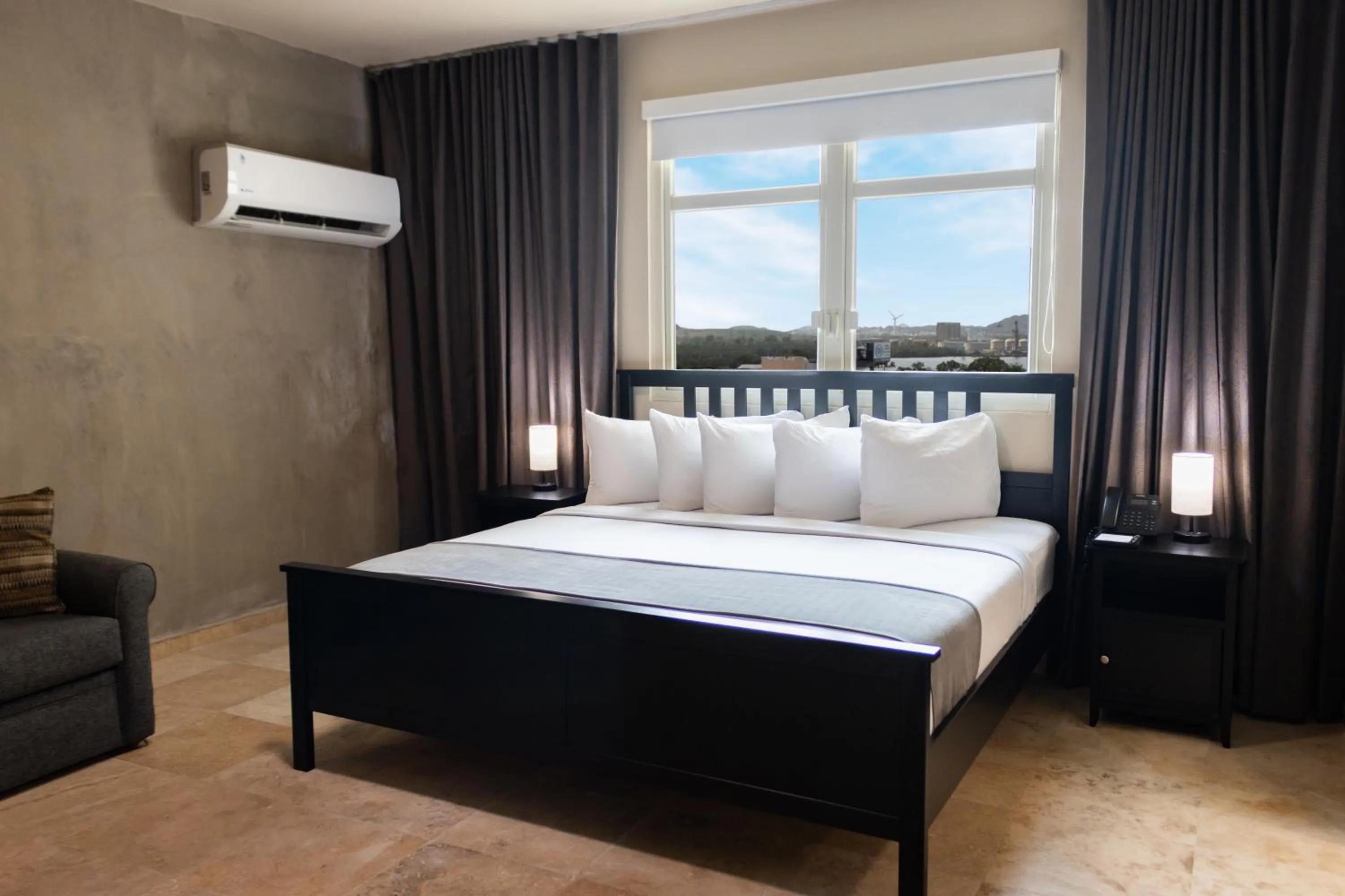 The Signature King Suite in Ciqala Suites Hotel - San Juan
