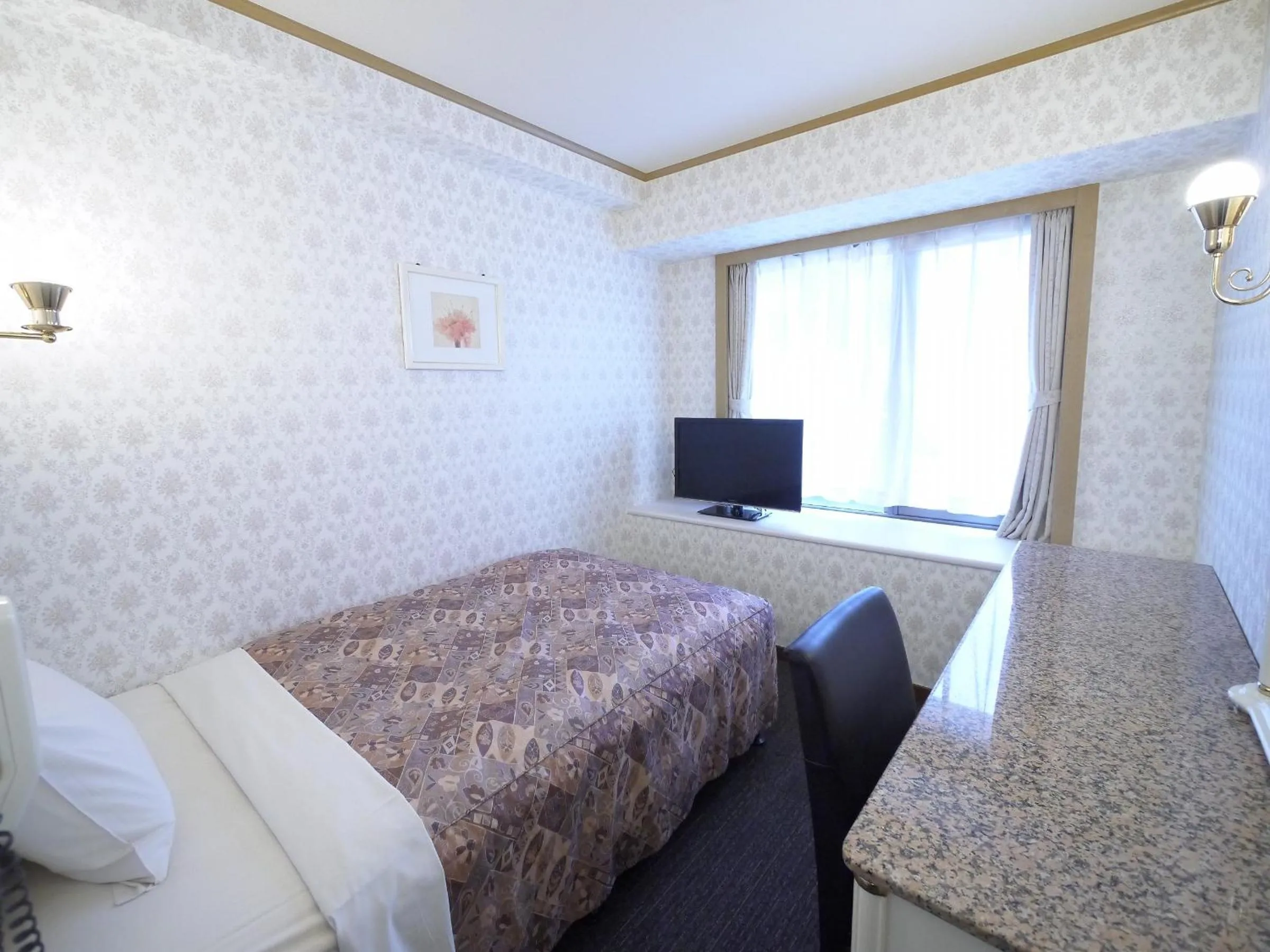 Double Room with Small Double Bed - single occupancy - Smoking in U-Community Hotel
