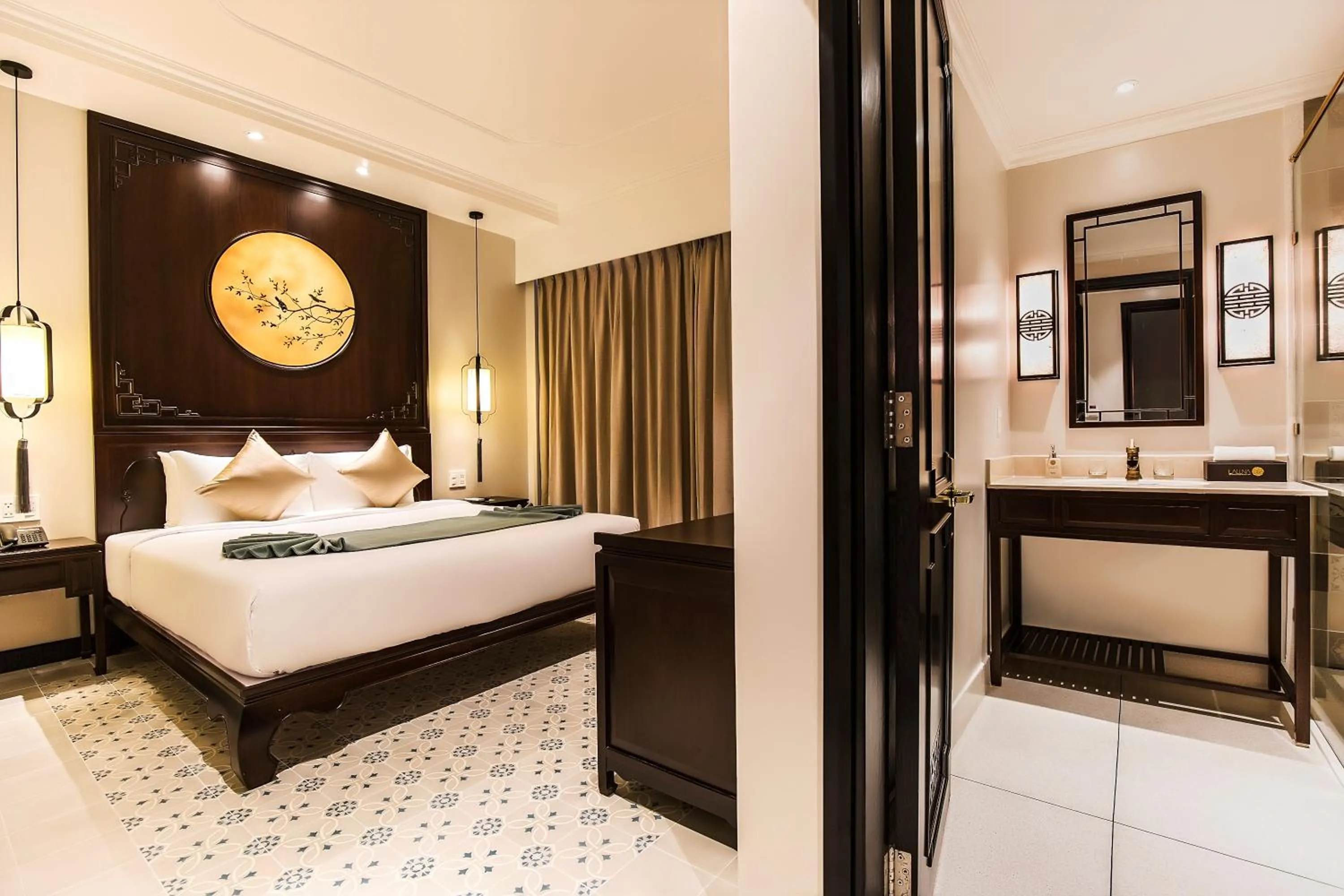 Superior Double Room with Large Window in Laluna Hoi An Riverside Hotel & Spa