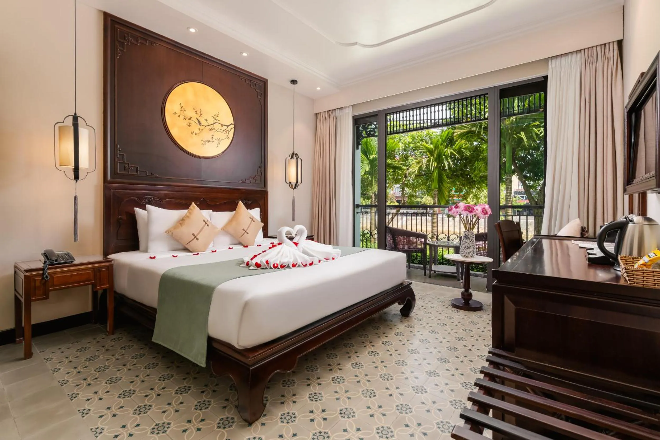Super Deluxe Double Room with Balcony and River View in Laluna Hoi An Riverside Hotel & Spa