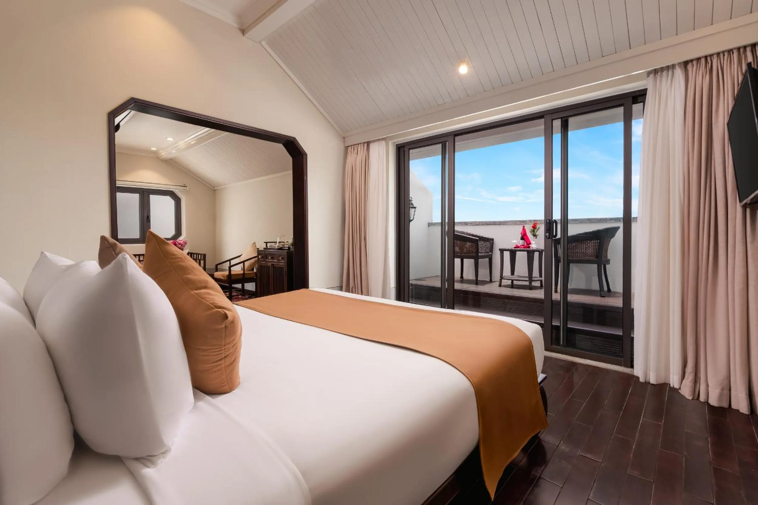 King Suite with Balcony and River View in Laluna Hoi An Riverside Hotel & Spa